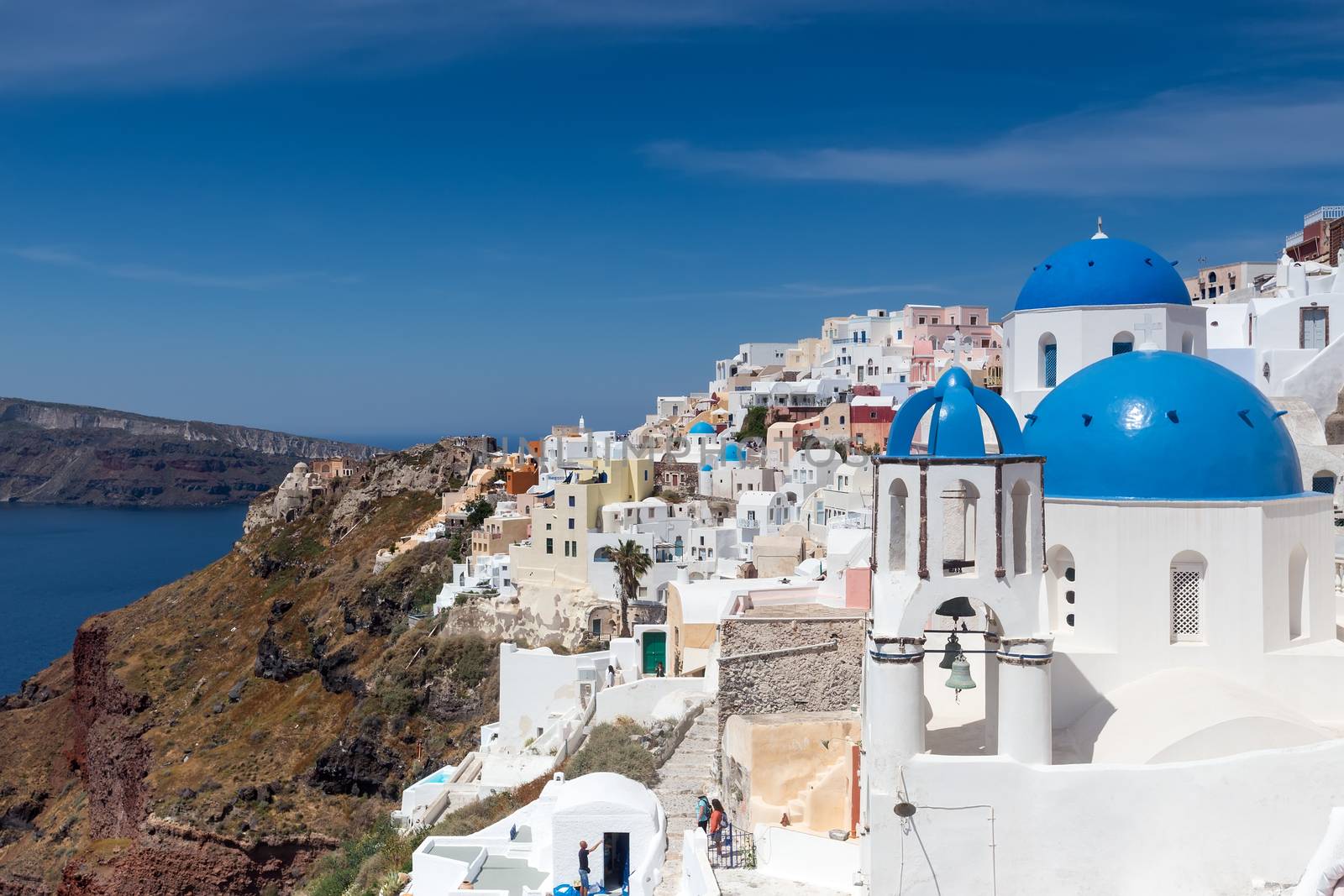 Blue and white church of Oia village on Santorini island. Greece by ververidis