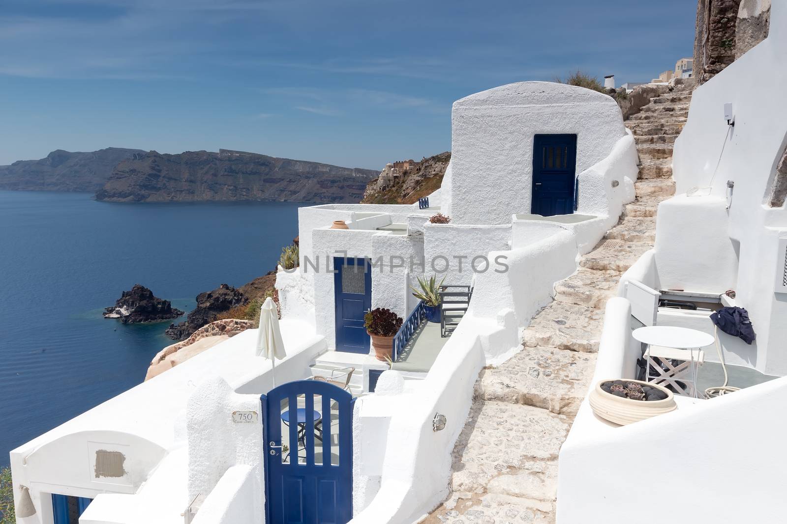 White architecture of Oia village on Santorini island, Greece by ververidis