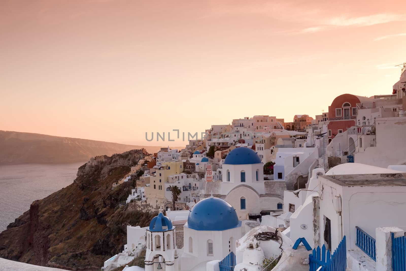 The sunset at Oia village in Santorini island in Greece by ververidis
