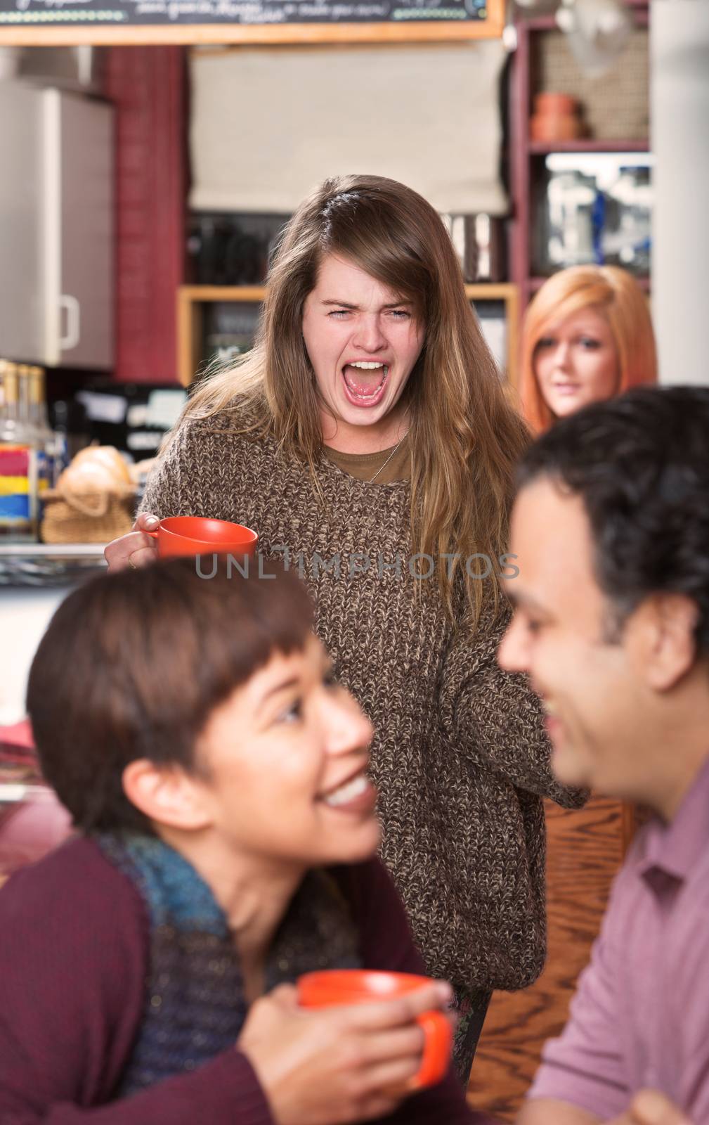 Adult female crying in cafe after seeing boyfriend cheat on her