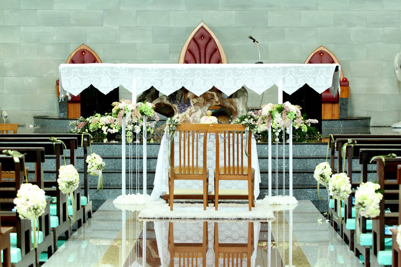 Table set for bride and groom in church