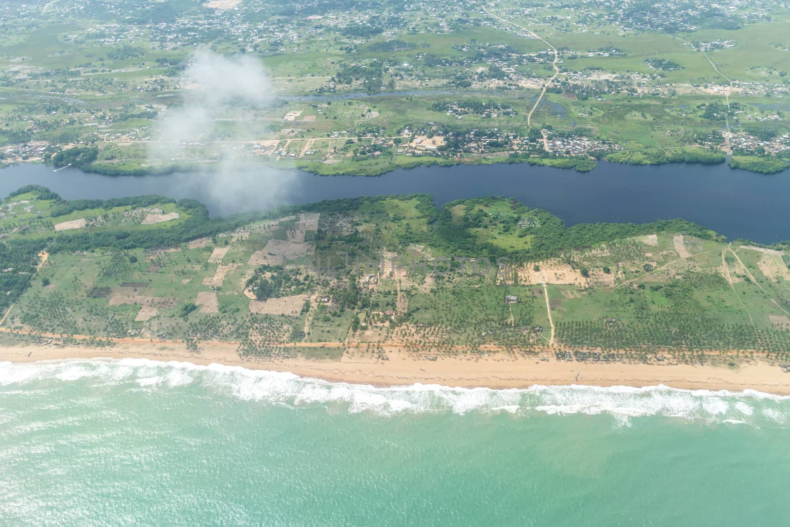 Aerial view of the Atlantic Ocean coastline along the shores of Cotonou, Benin