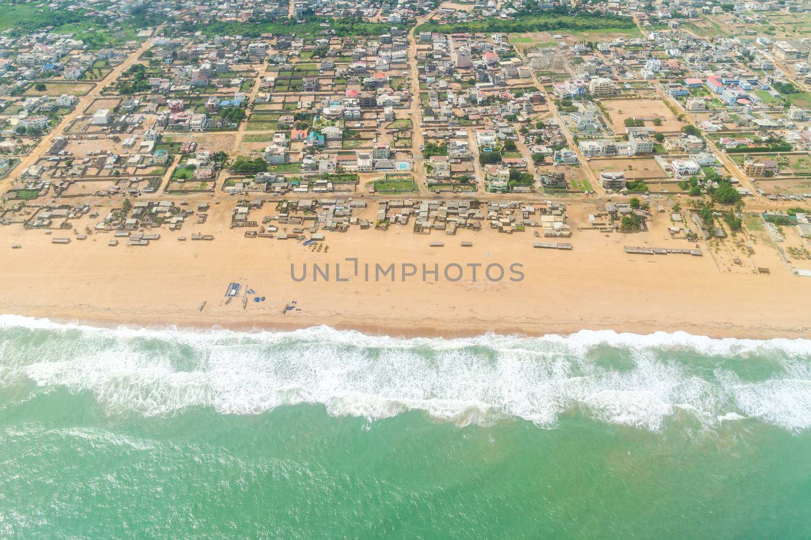 Aerial view of the Atlantic Ocean coastline along the shores of Cotonou, Benin