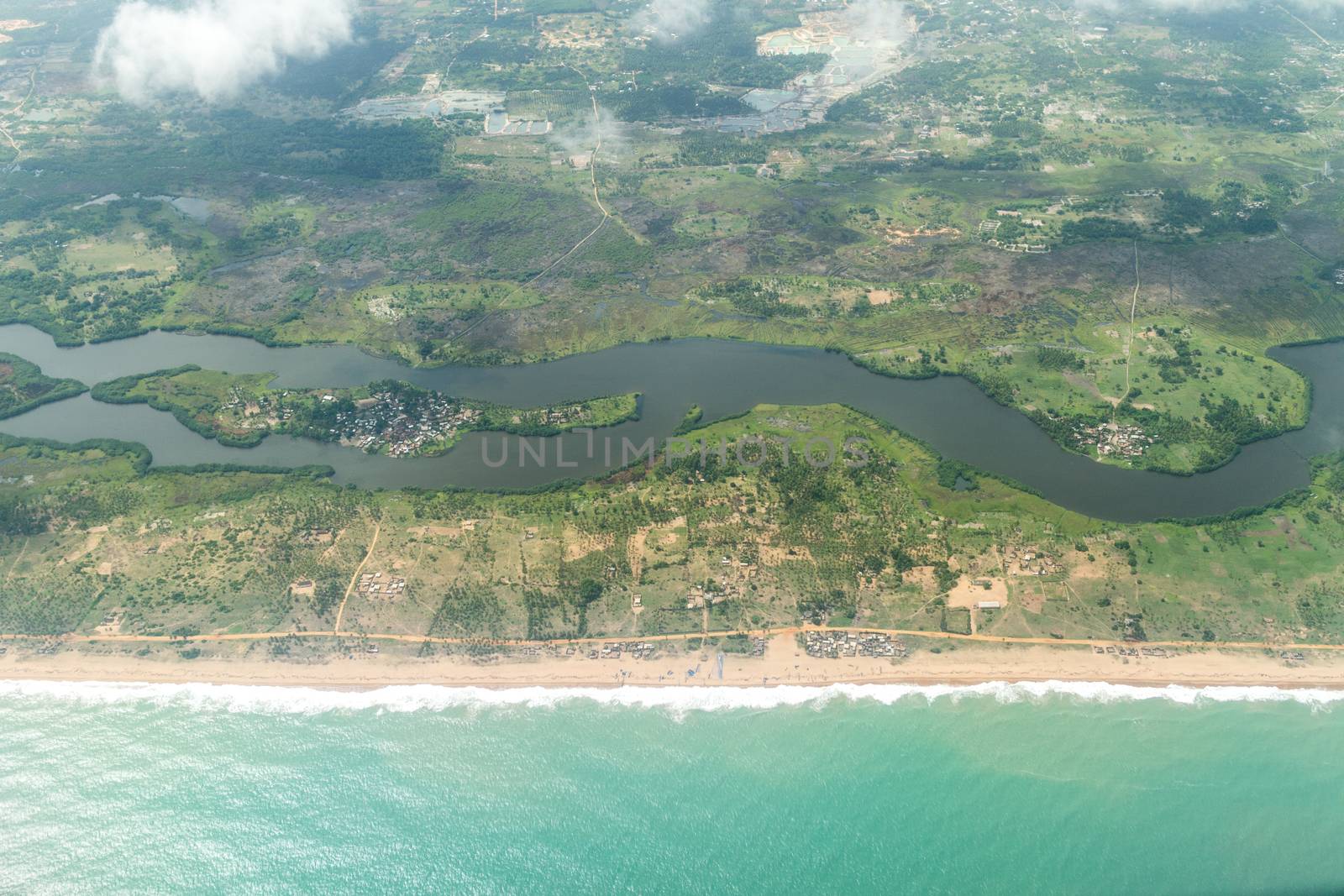 Aerial view of the Atlantic Ocean coastline along the shores of Cotonou, Benin