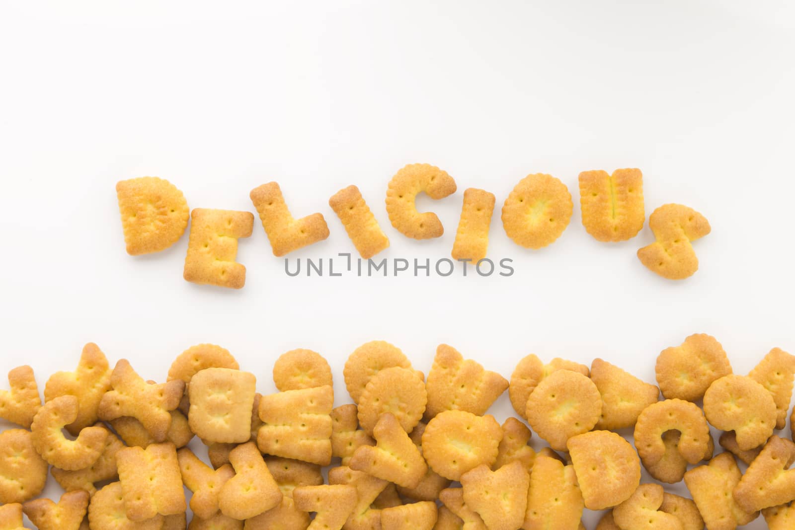 Alphabet cookie biscuits word DELICIOUS by vinnstock