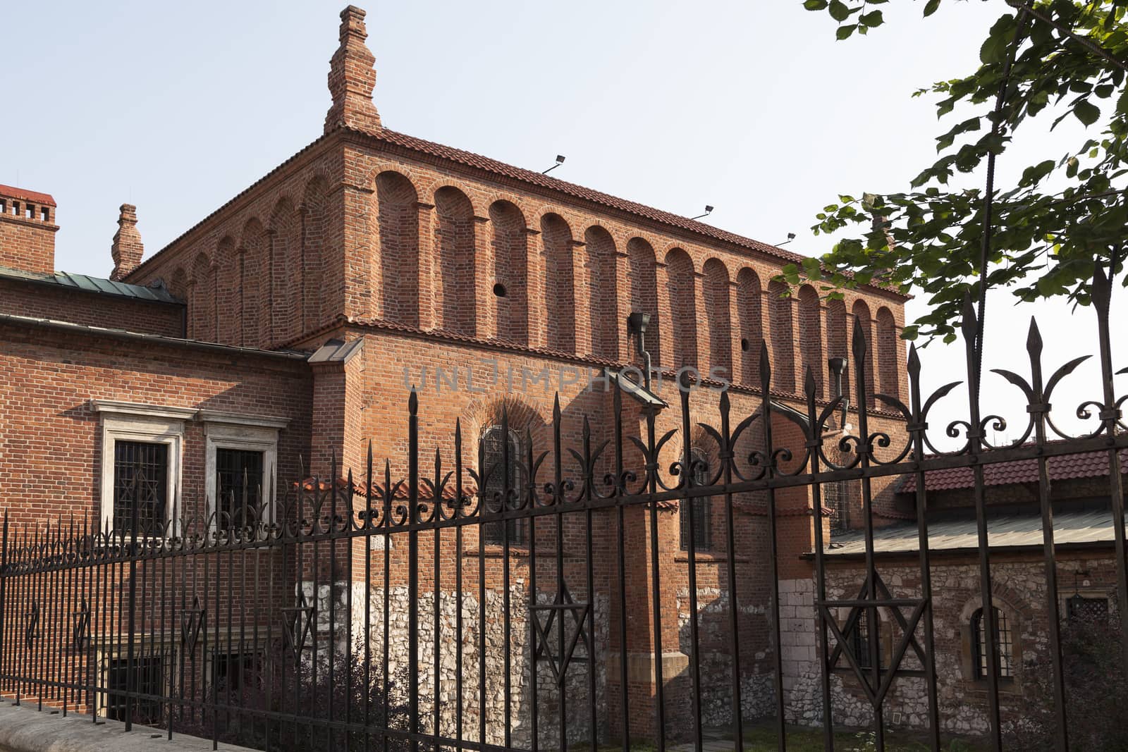 old synagogue in jewish district of krakow - kazimierz on szeroka street in poland