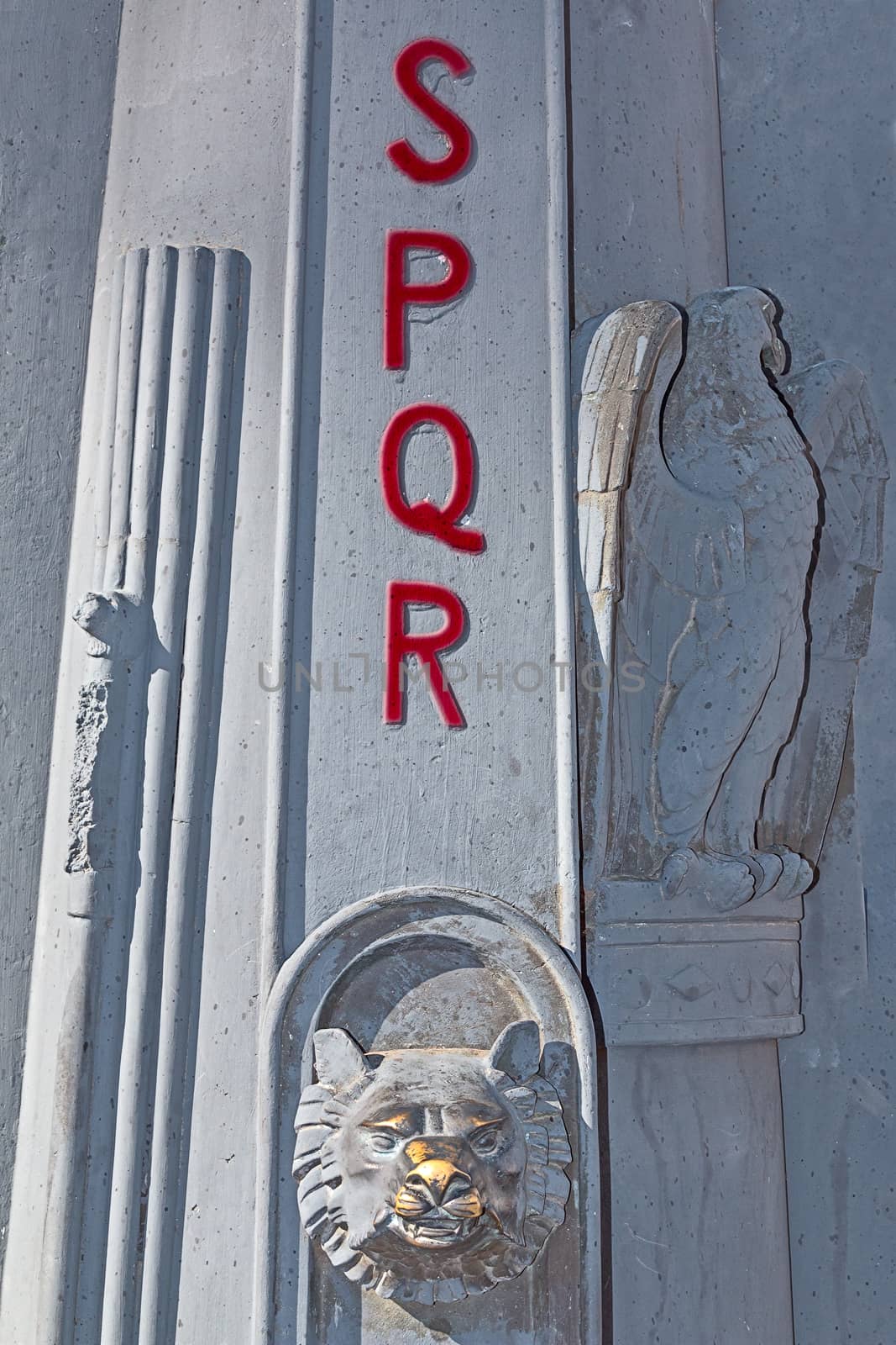 roman symbol on lamppost