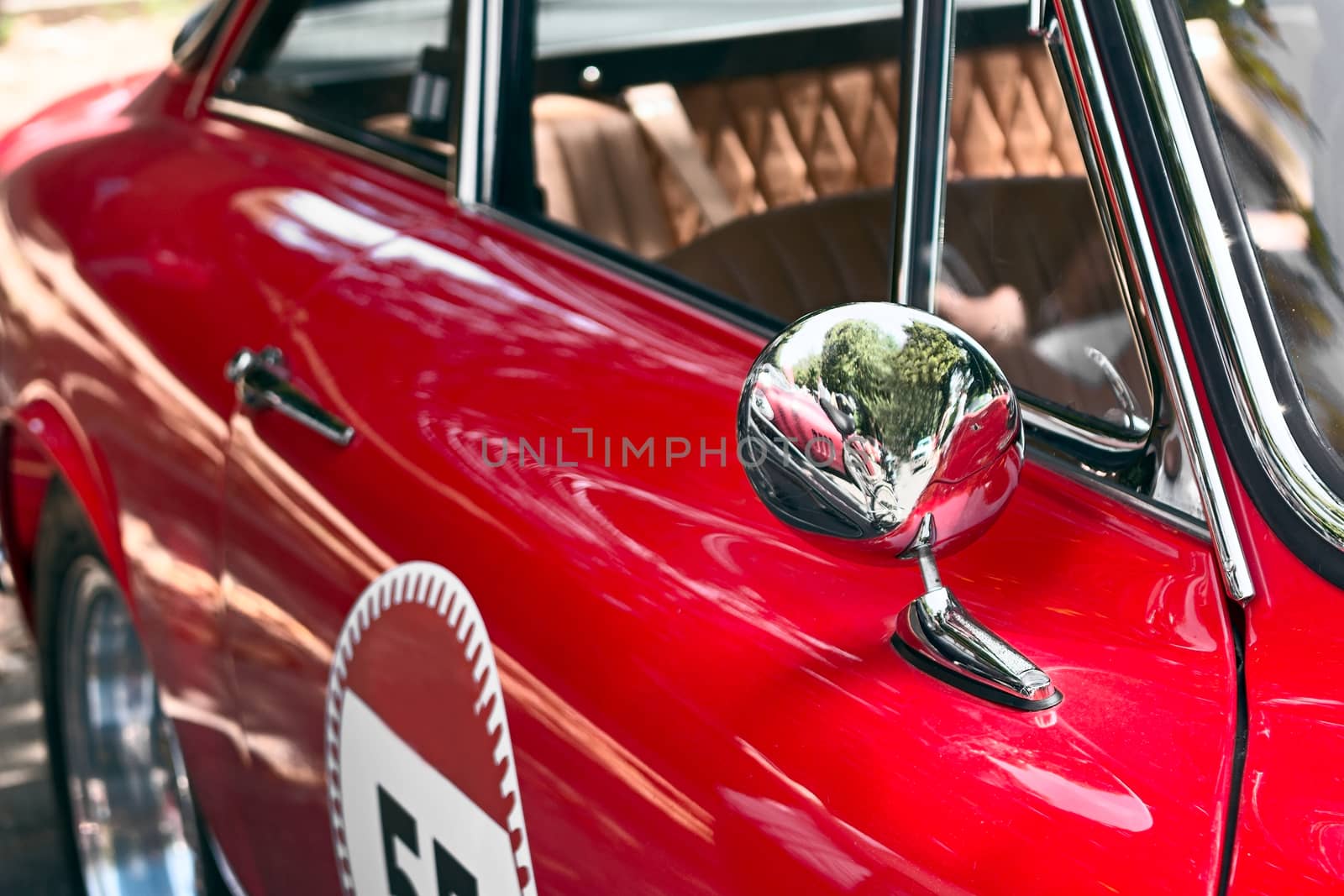 JUNE 19 2015 - ROME, ITALY detail of old red car