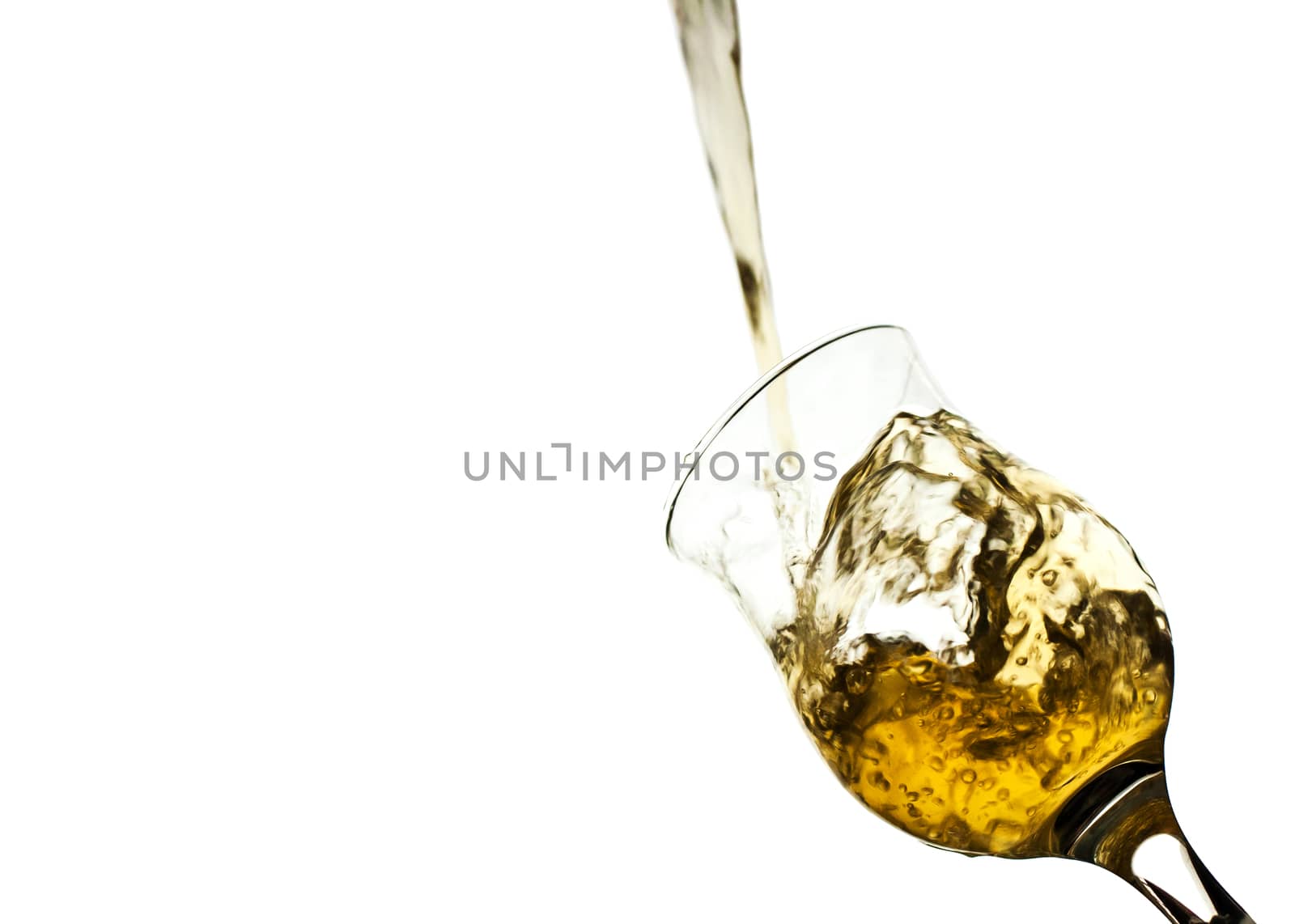 Yellow Water Splashing From Glass Isolated On White Background by jimbophoto
