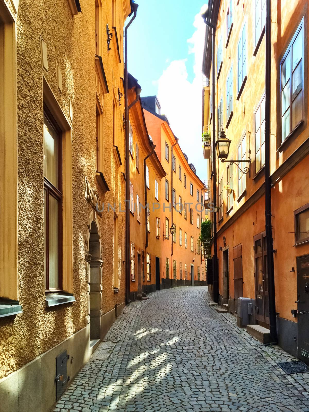 Sunny street in Gamla Stan, historic center of Stockholm.