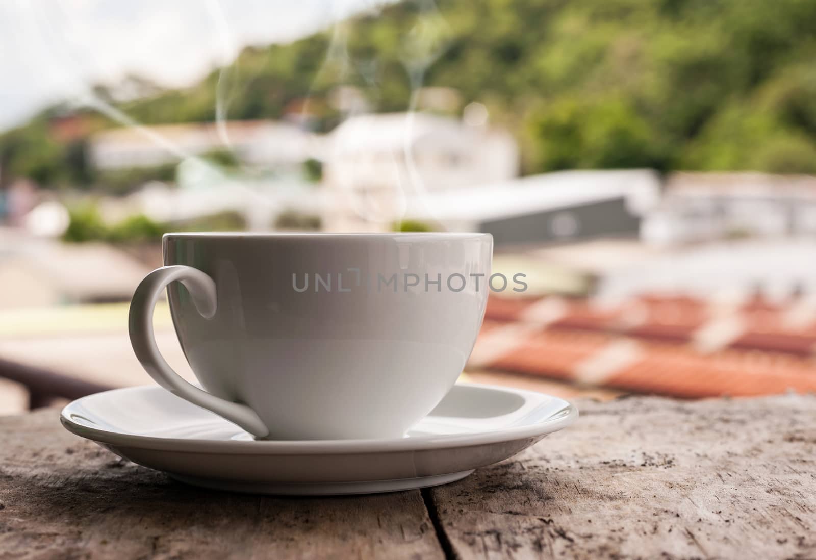 Morning coffee and smoke with sunlight on bokeh background 
