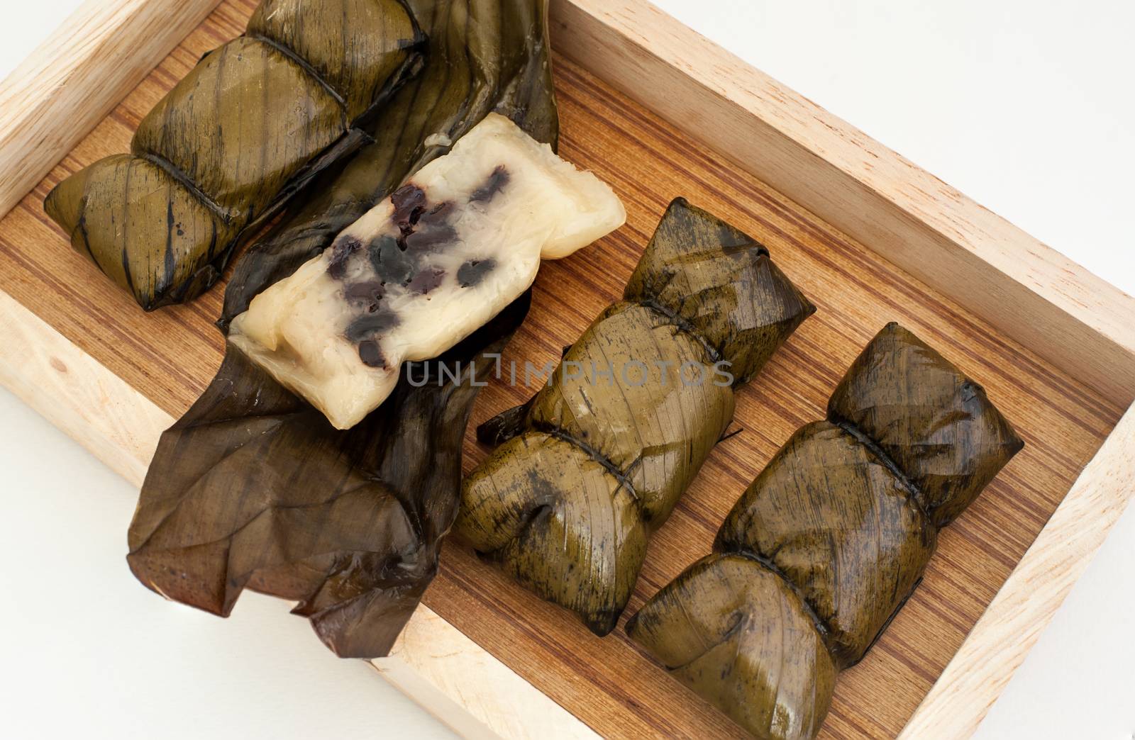 Traditional Thai food style, Glutinous rice steamed with banana wrap banana leaf ( Khao Tom Mat or Khao Tom Pad ) Thai dessert.