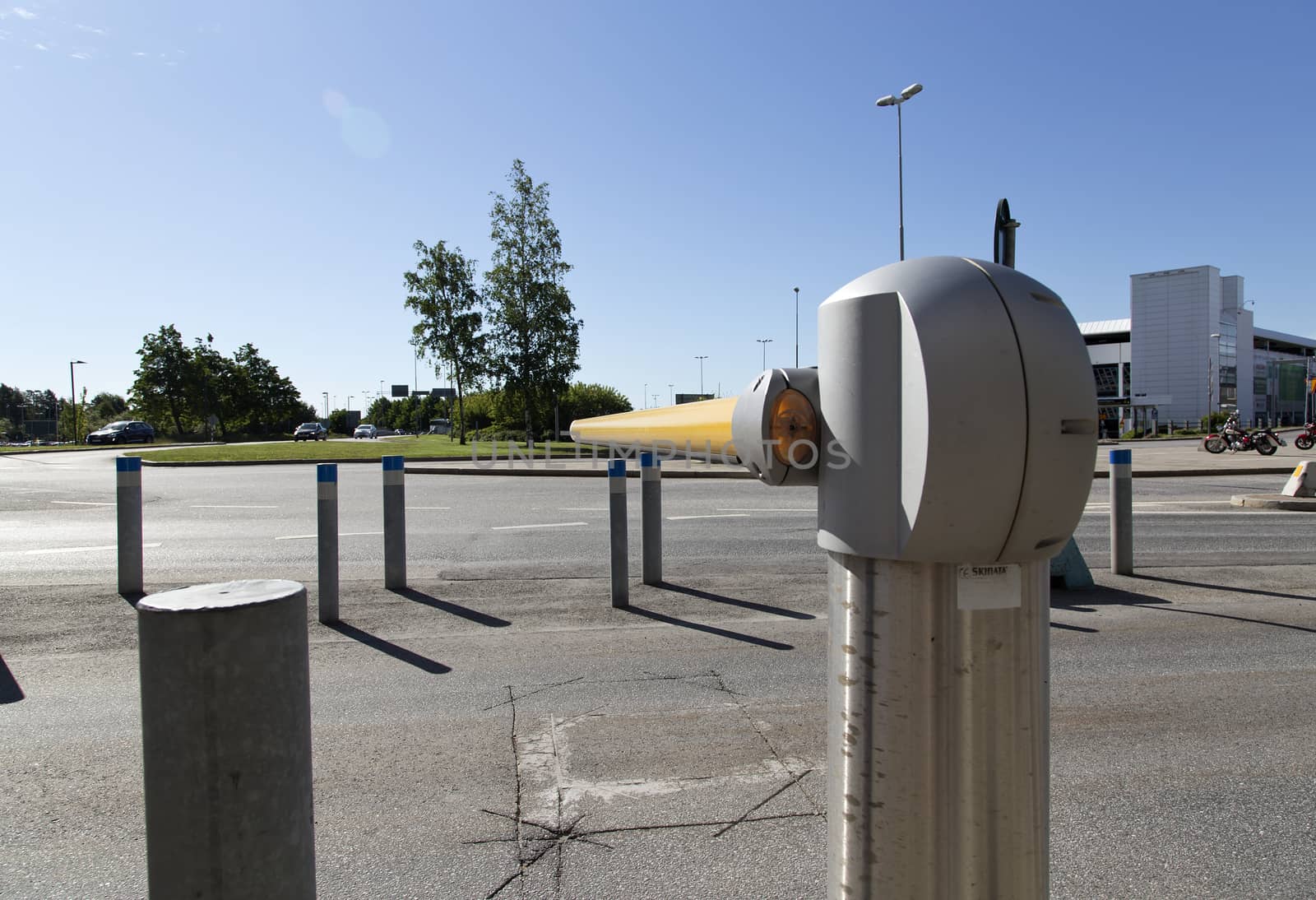 An automated road barrier to control traffic