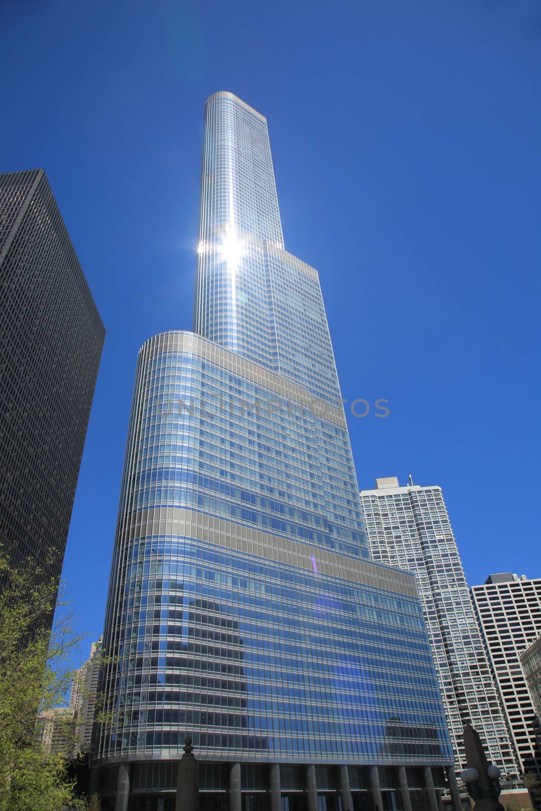 Trump International Hotel and Tower, with sunlight reflections, in the Chicago skyline.
