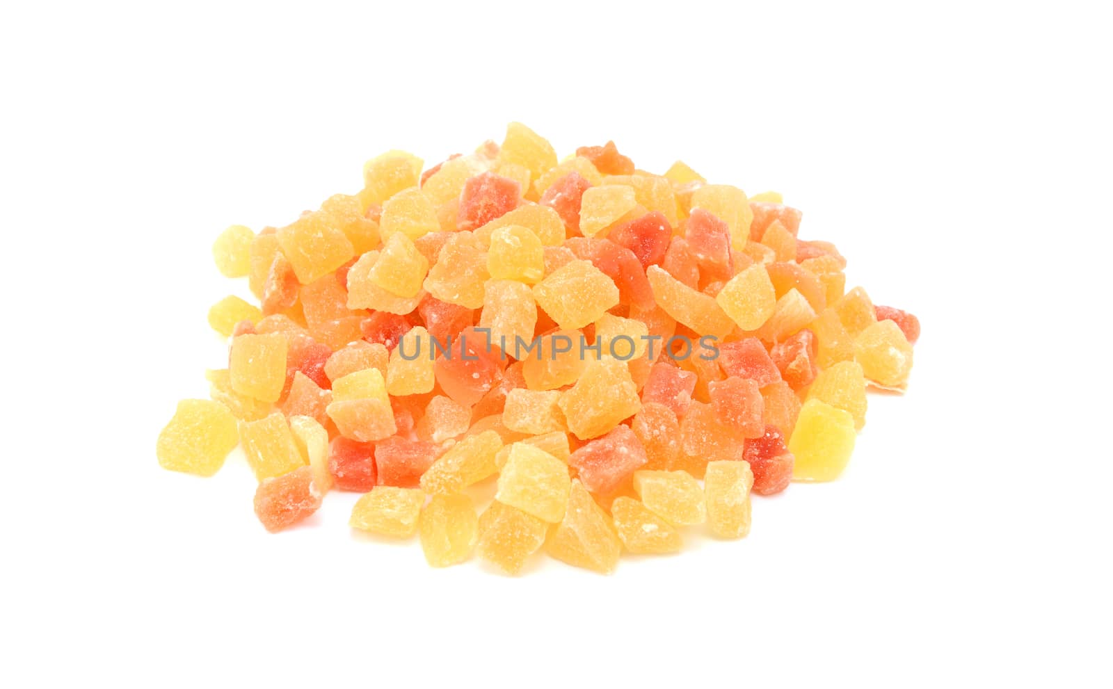 Dried pineapple and papaya pieces, isolated on a white background