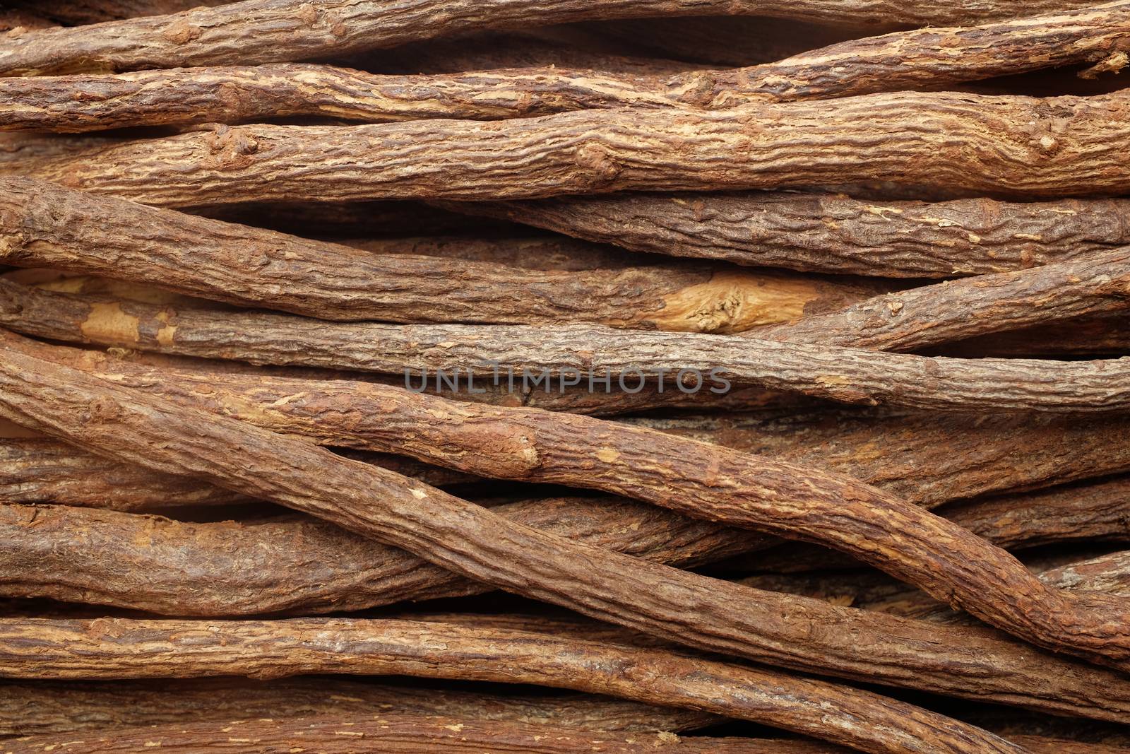 Liquorice root pieces as an abstract background texture