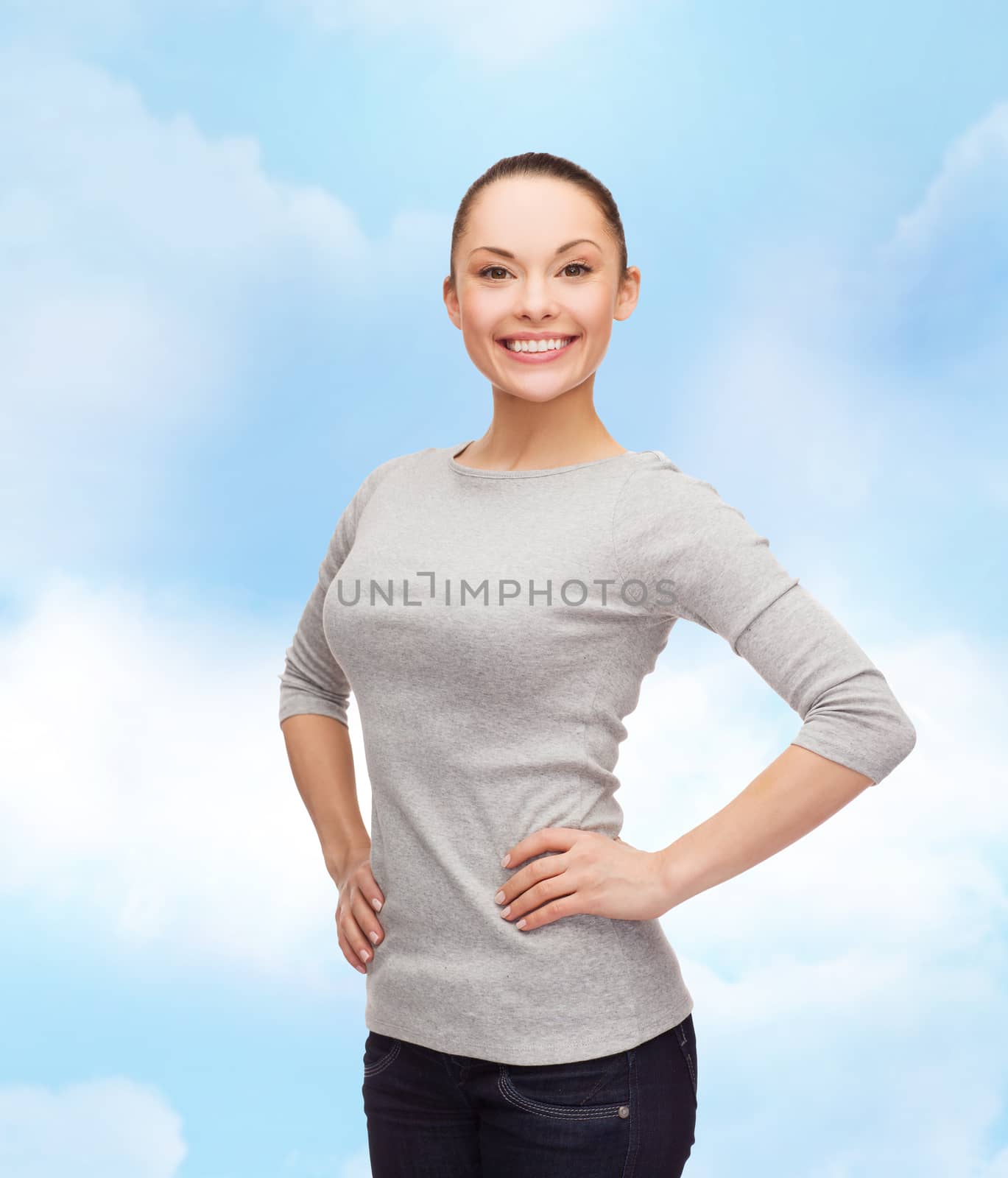 smiling asian woman over white background by dolgachov