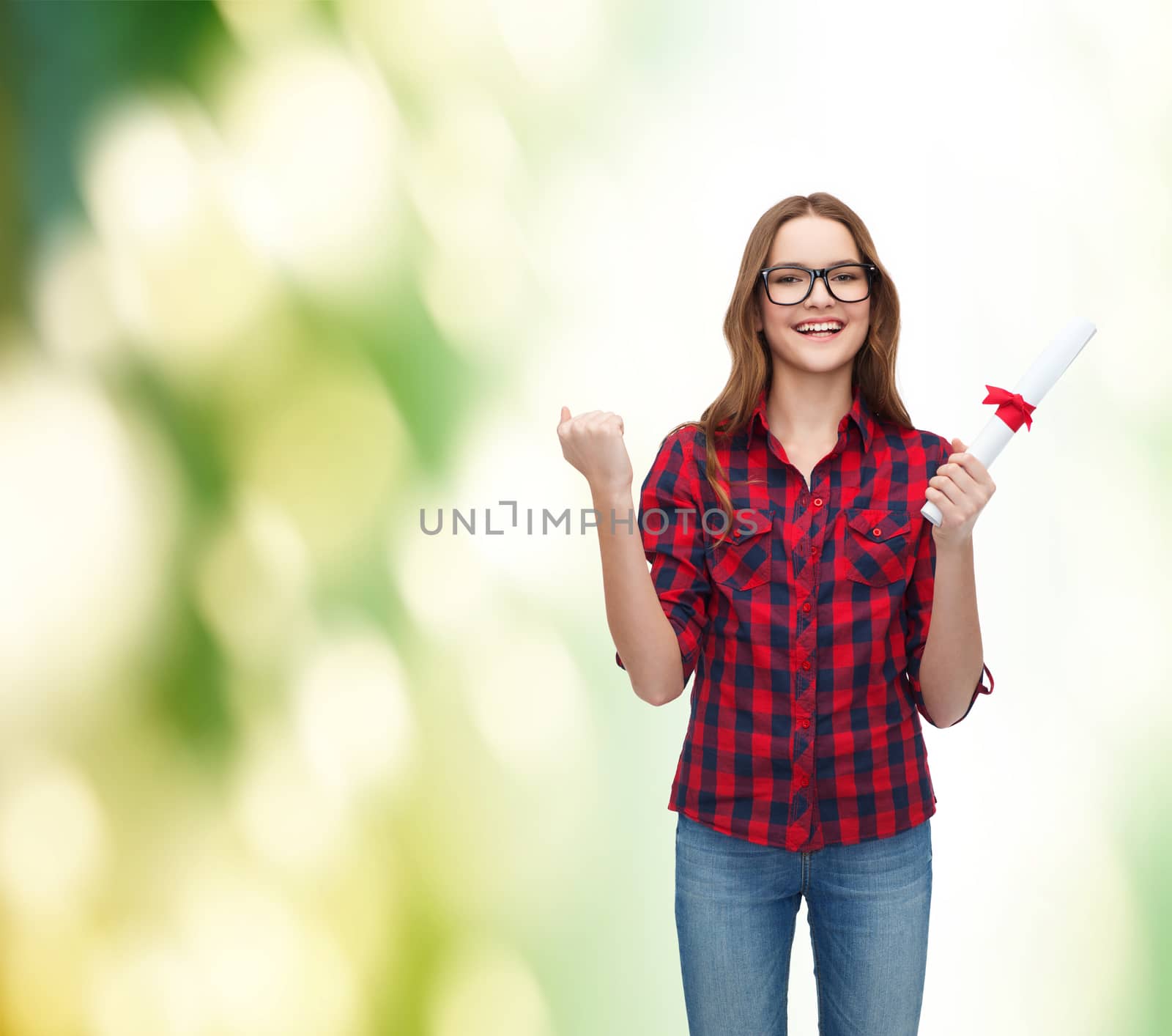 education concept - smiling female student in eyeglasses with diploma