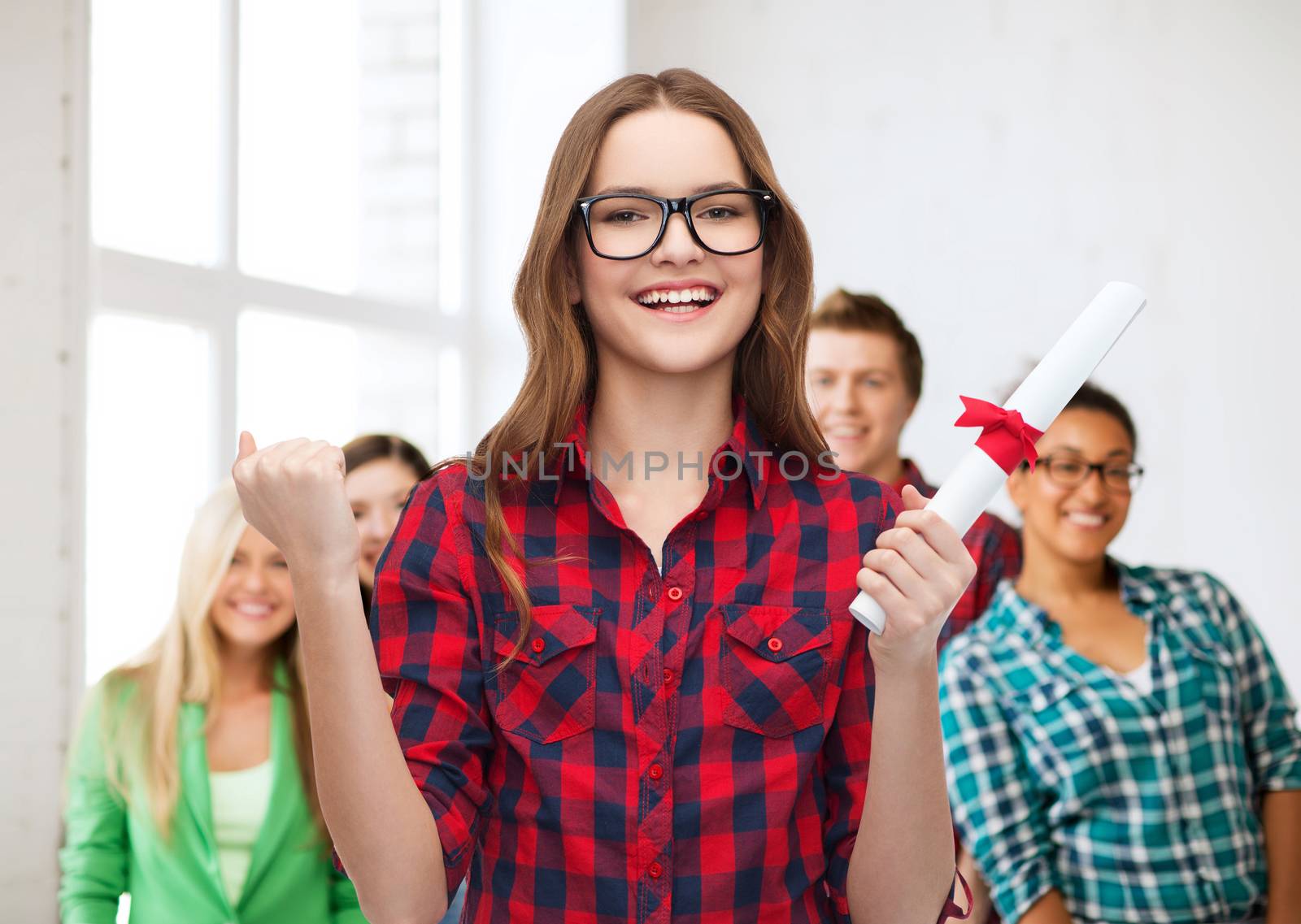 university and education concept - smiling female student in eyeglasses with diploma