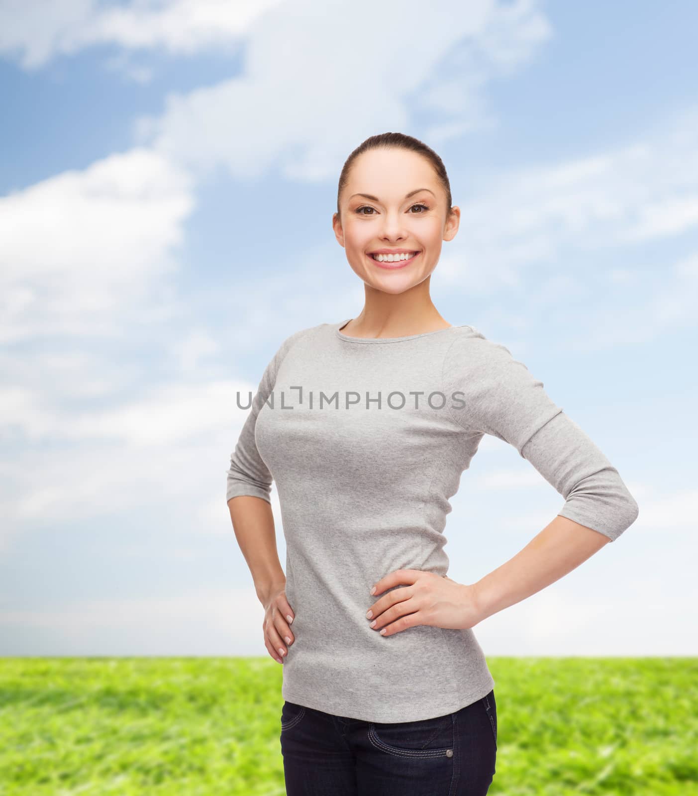 smiling asian woman over white background by dolgachov