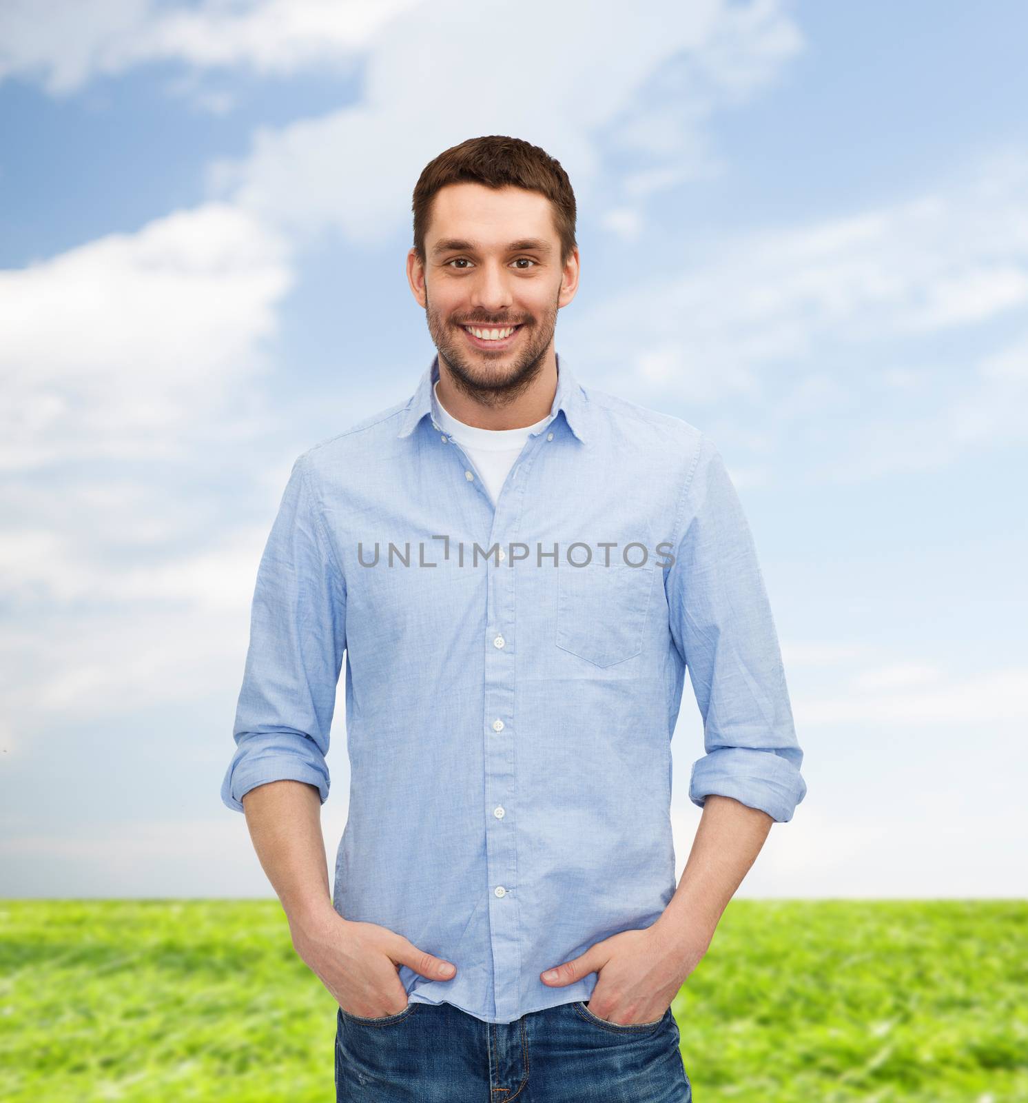 happiness and people concept - smiling man