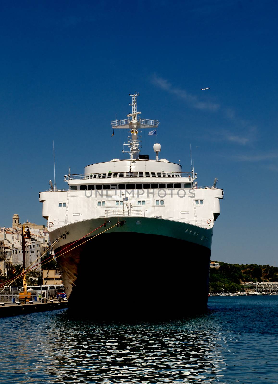 Luxury Giant Cruise Ship on Anchored in Port on Blue Sky background Outdoors. Port of Mahon, Balearic Islands