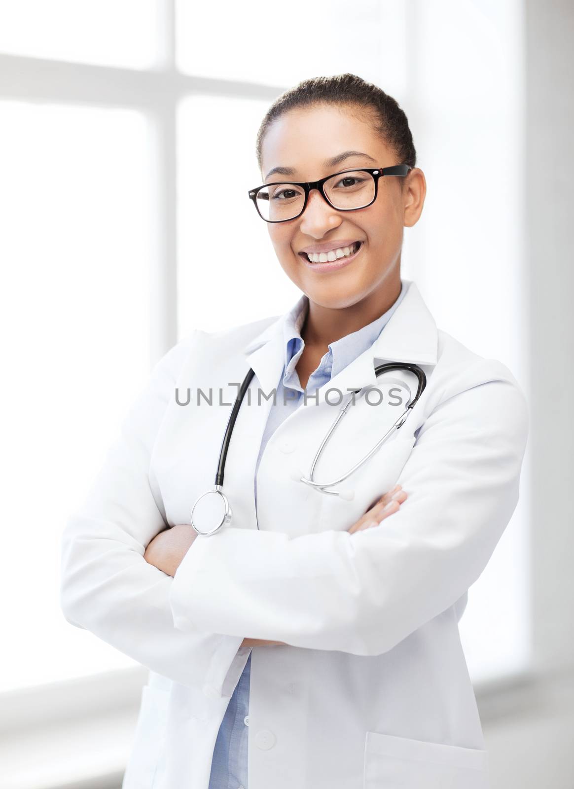 african female doctor in hospital by dolgachov