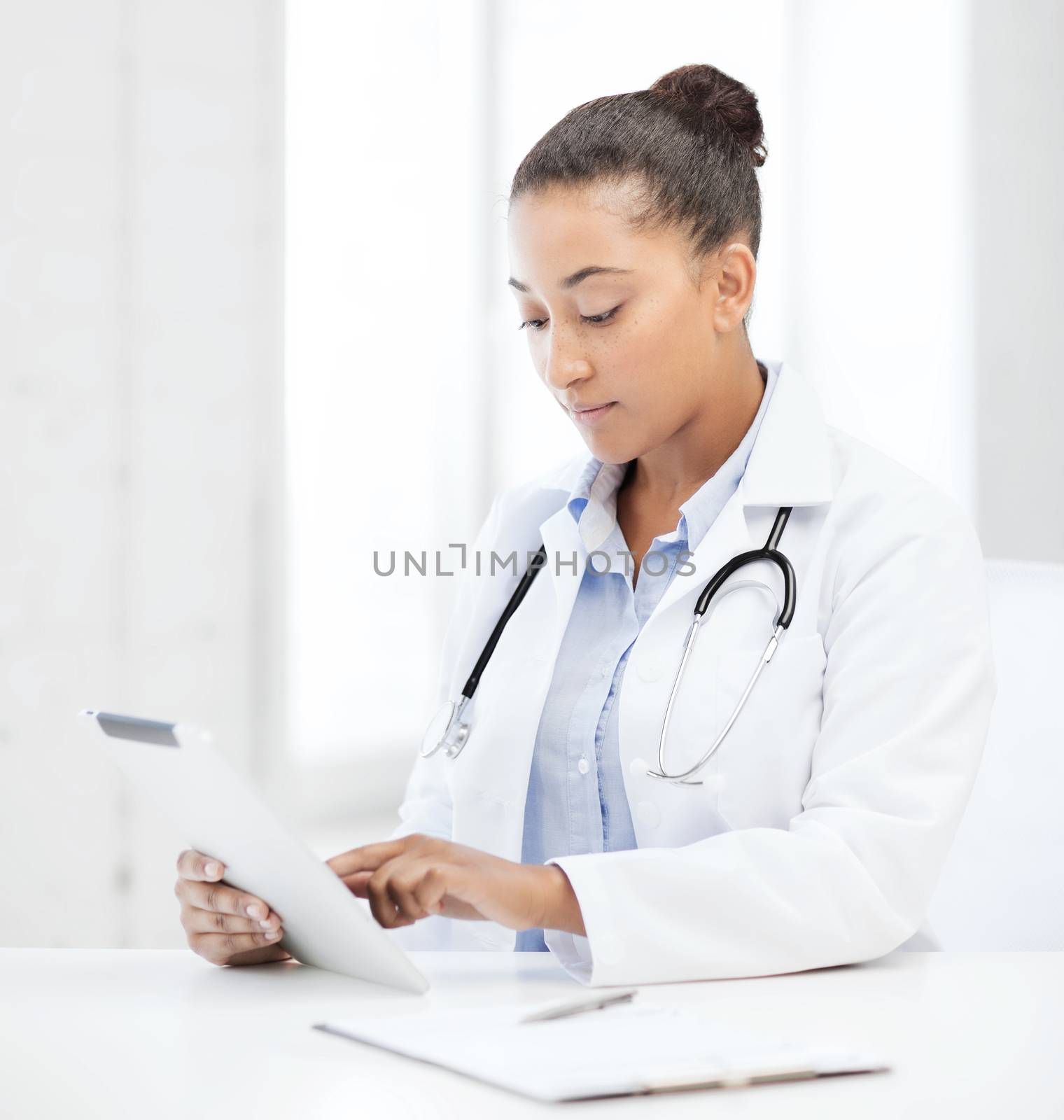 healthcare, medical and technology concept - african female doctor with tablet pc