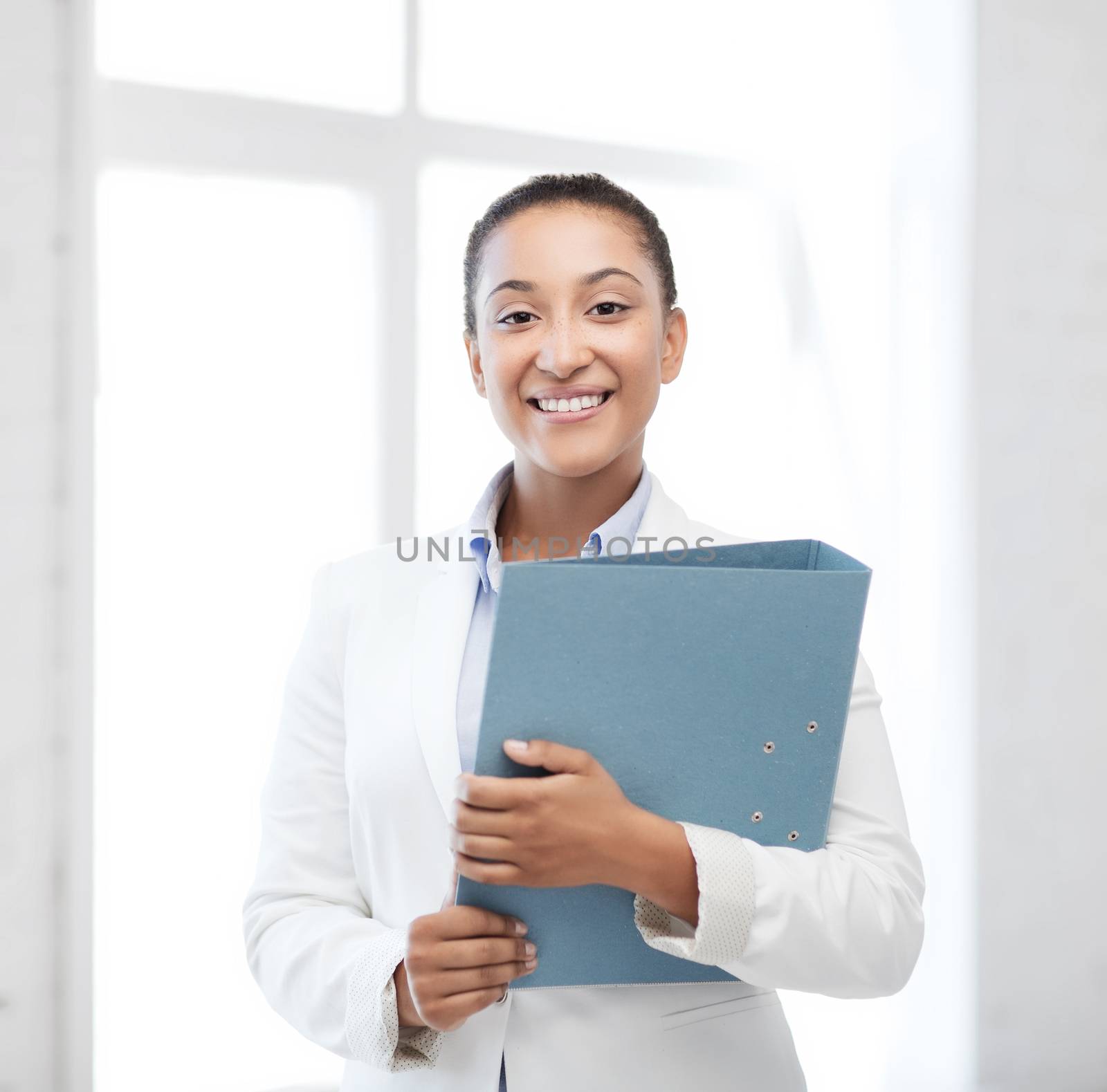 african businesswoman in office by dolgachov