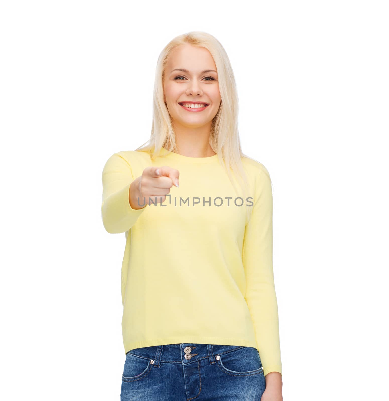 smiling woman pointing finger at you by dolgachov