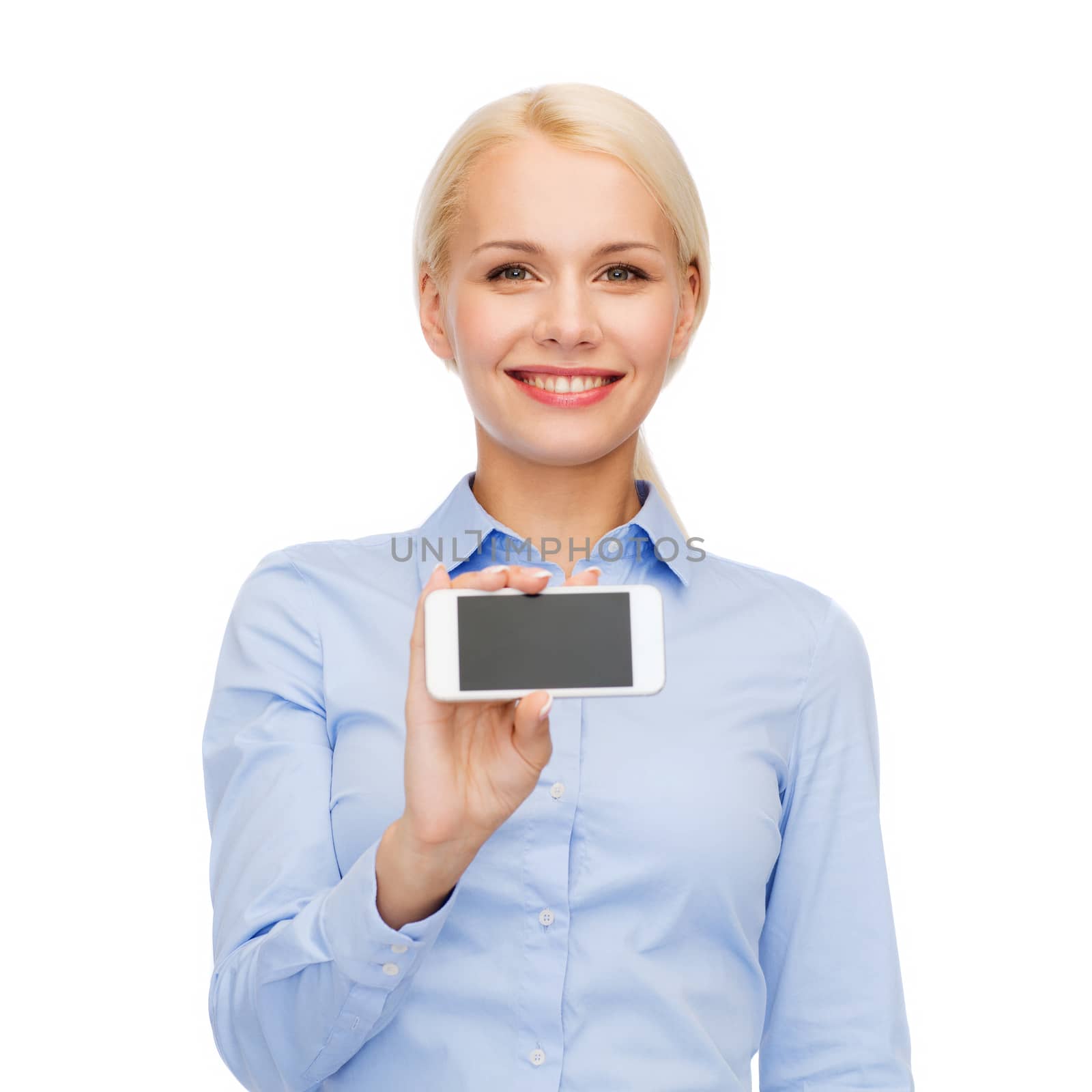smiling businesswoman with smartphone blank screen by dolgachov
