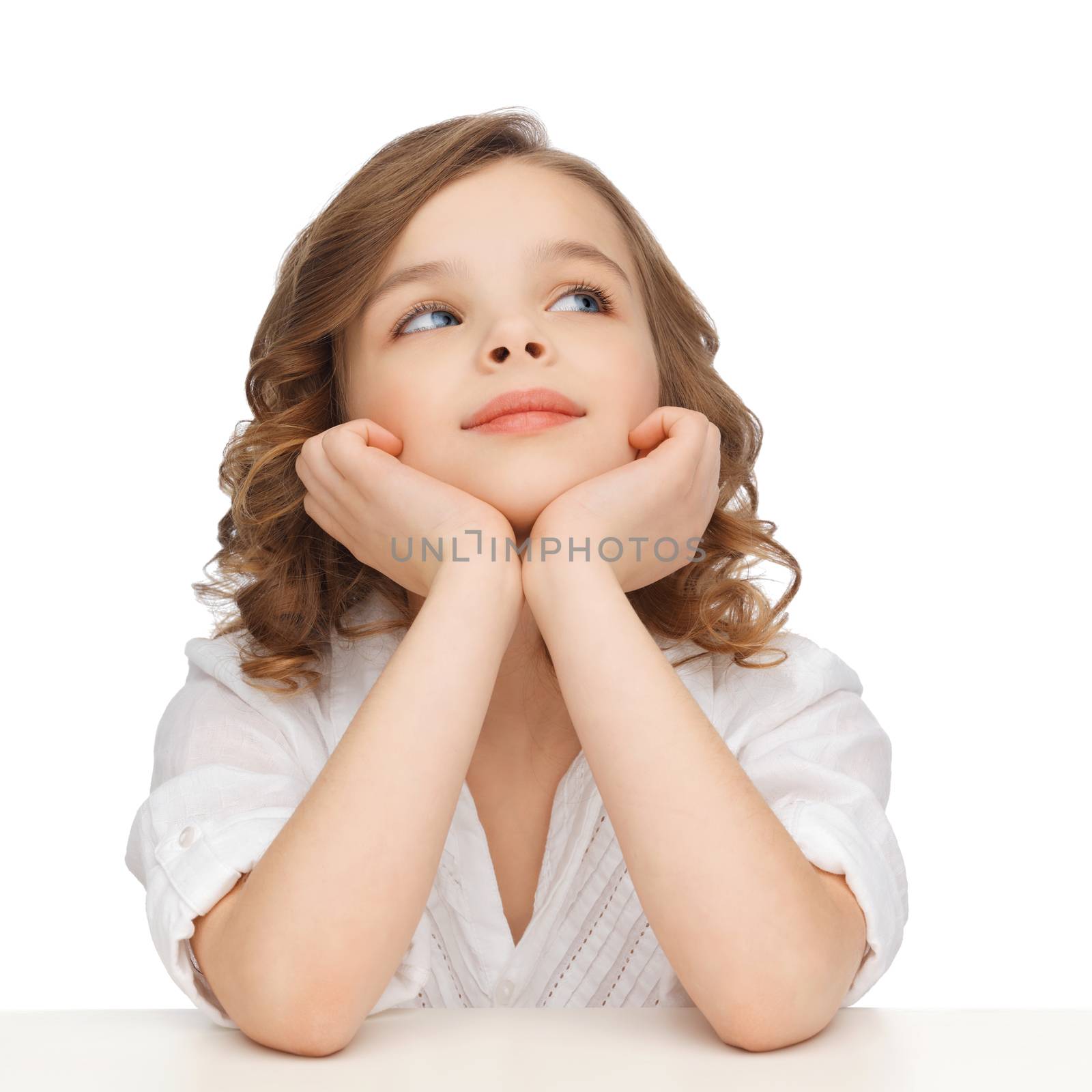 children and happy people concept - picture of pre-teen girl in casual clothes looking up and thinking