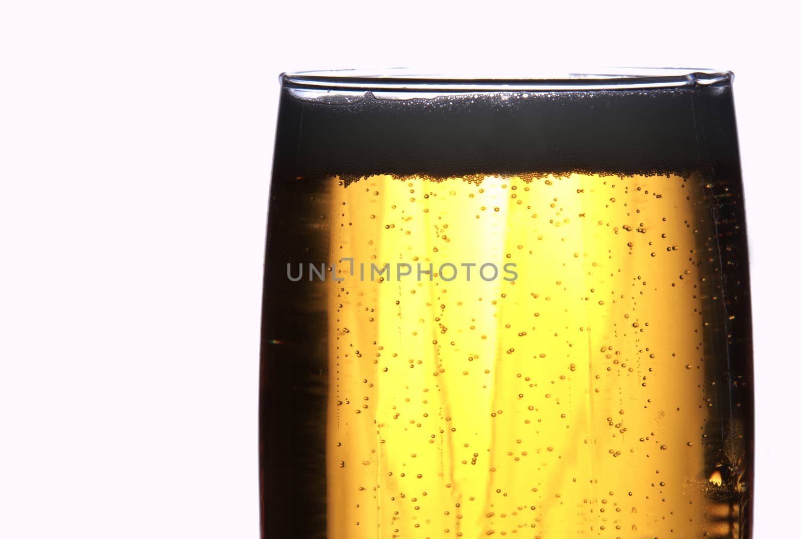 Alcohol conceptual image. Mug full of beer on black background.
