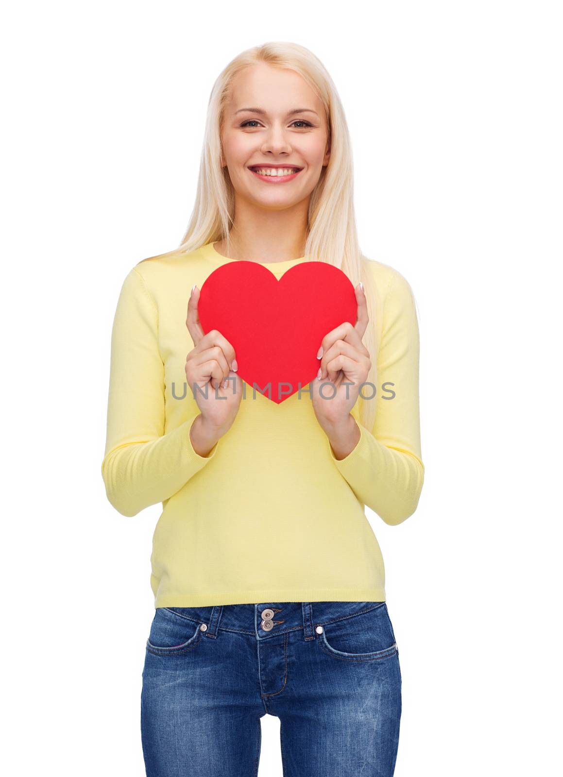 happiness, health and love concept - smiling woman with red heart