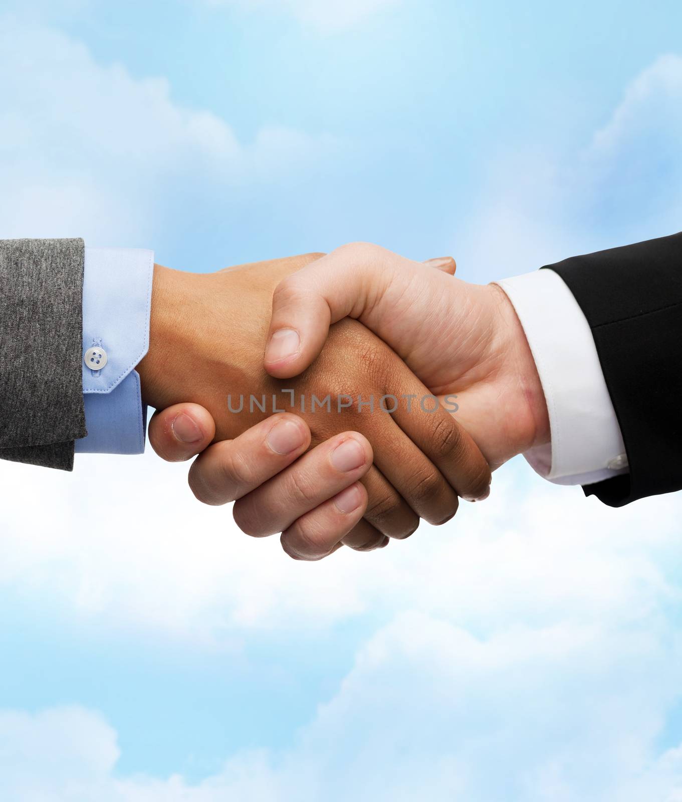 businessman and businesswoman shaking hands by dolgachov