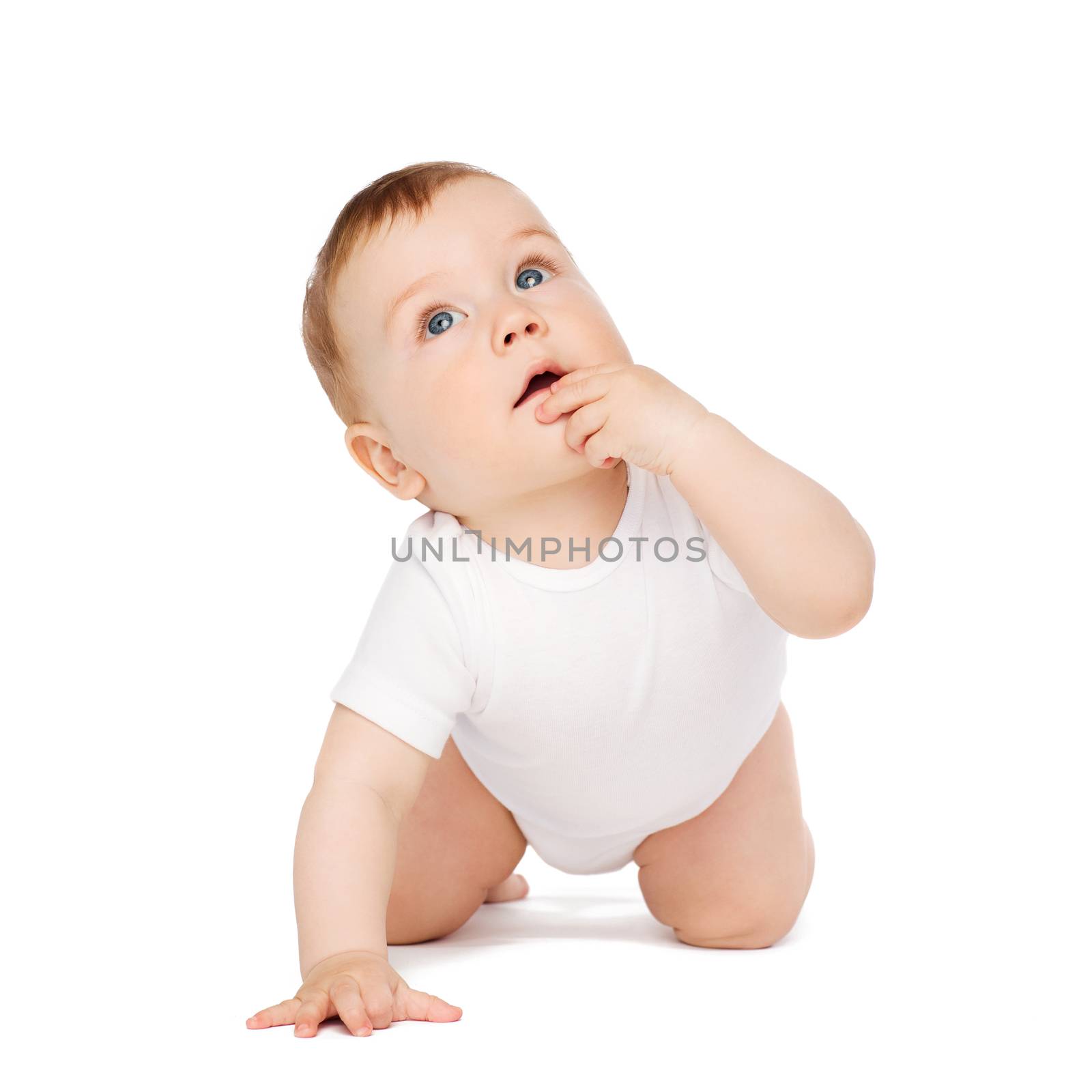 crawling curious baby looking up by dolgachov