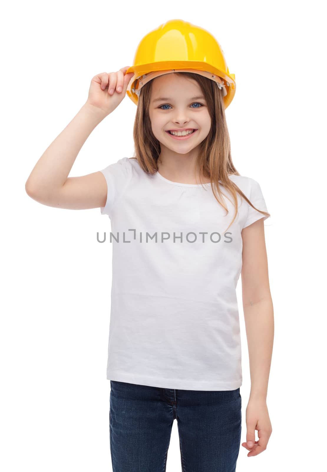 smiling little girl in protective helmet by dolgachov