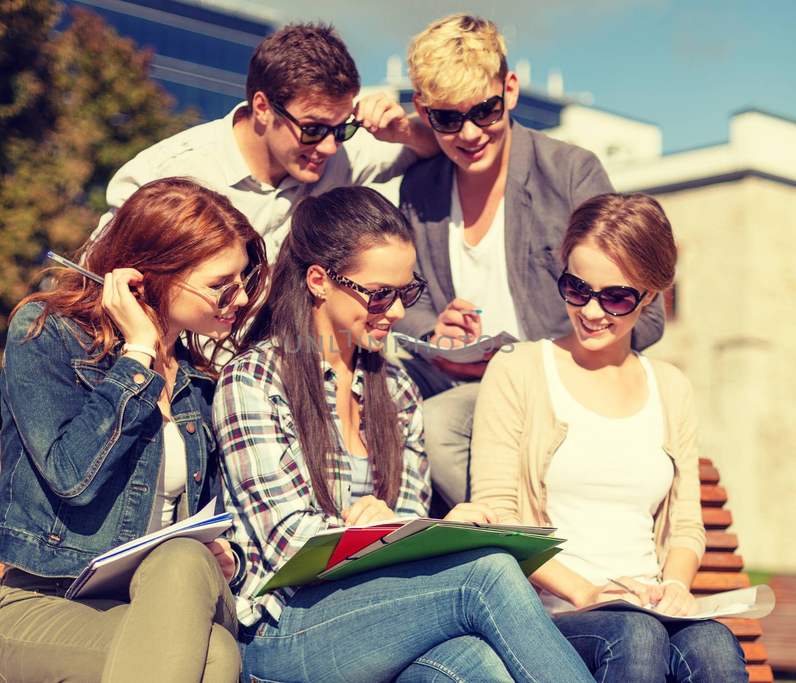 group of students or teenagers hanging out by dolgachov