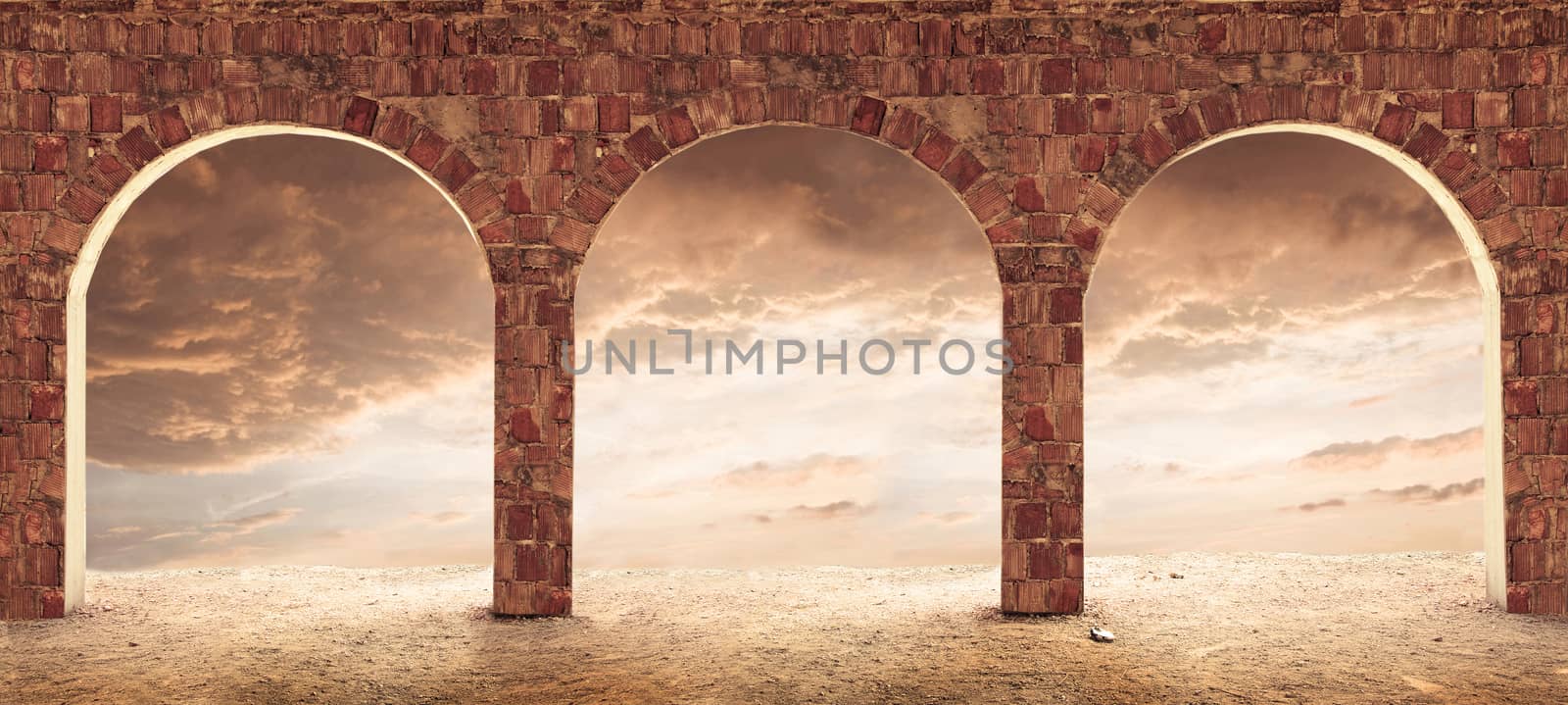Interior with brick columns and red sky outside.