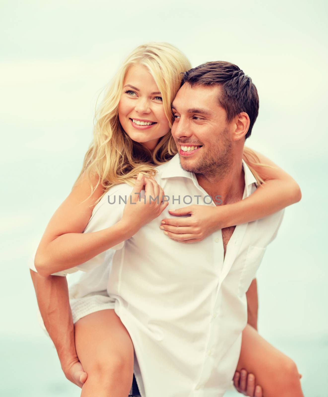 summer holidays, celebration and dating concept - couple at seaside