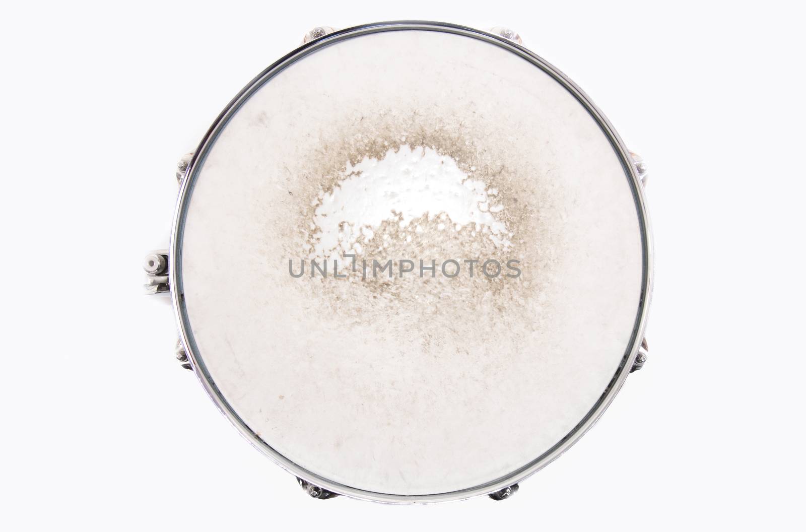 Music conceptual image. Close up of a drum snare on isolated background.