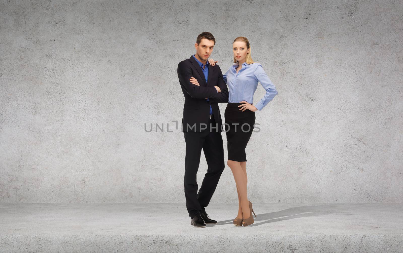 serious businessman and businesswoman by dolgachov