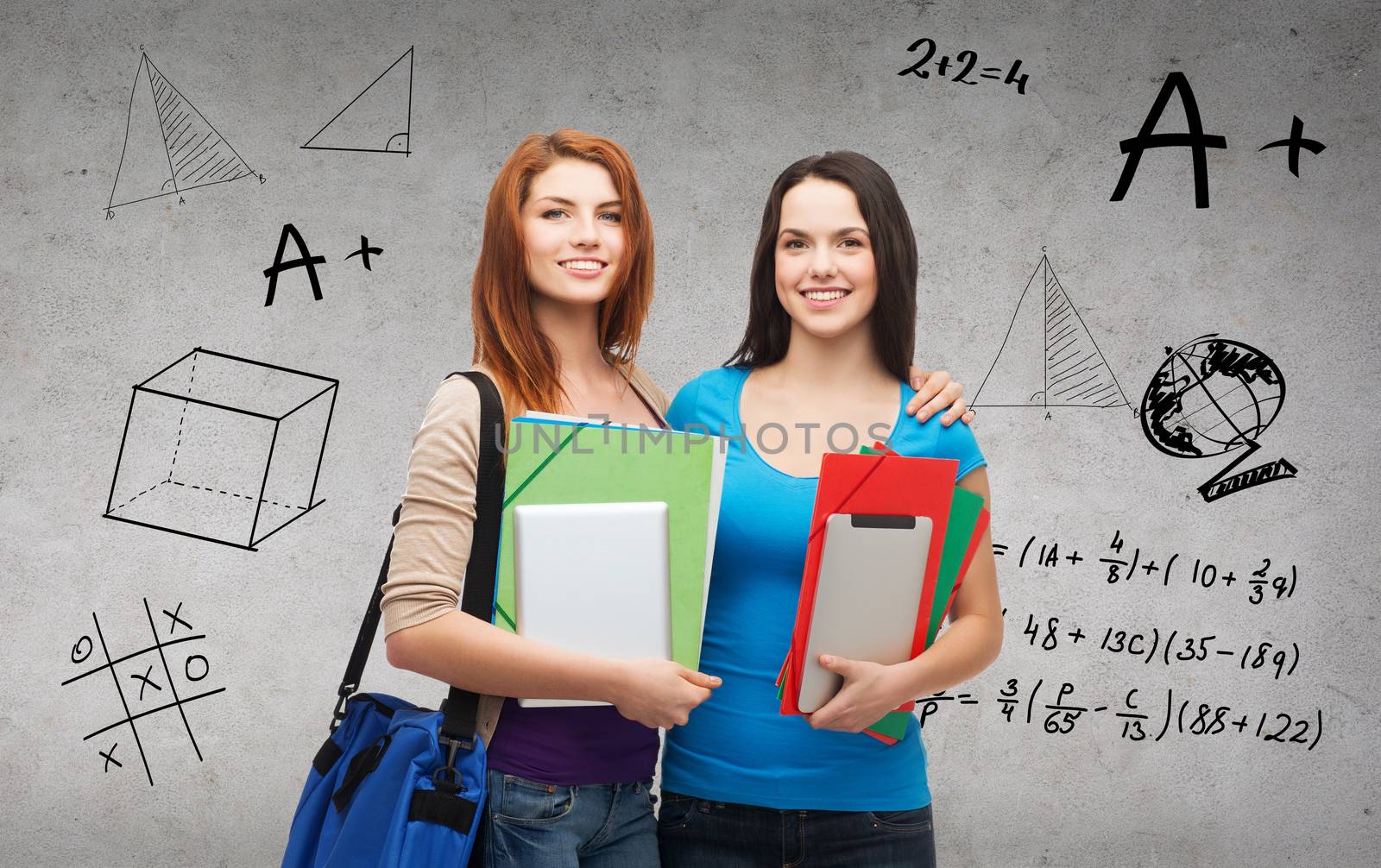 education, technology and people concept - two smiling students with bag, folders and tablet pc standing