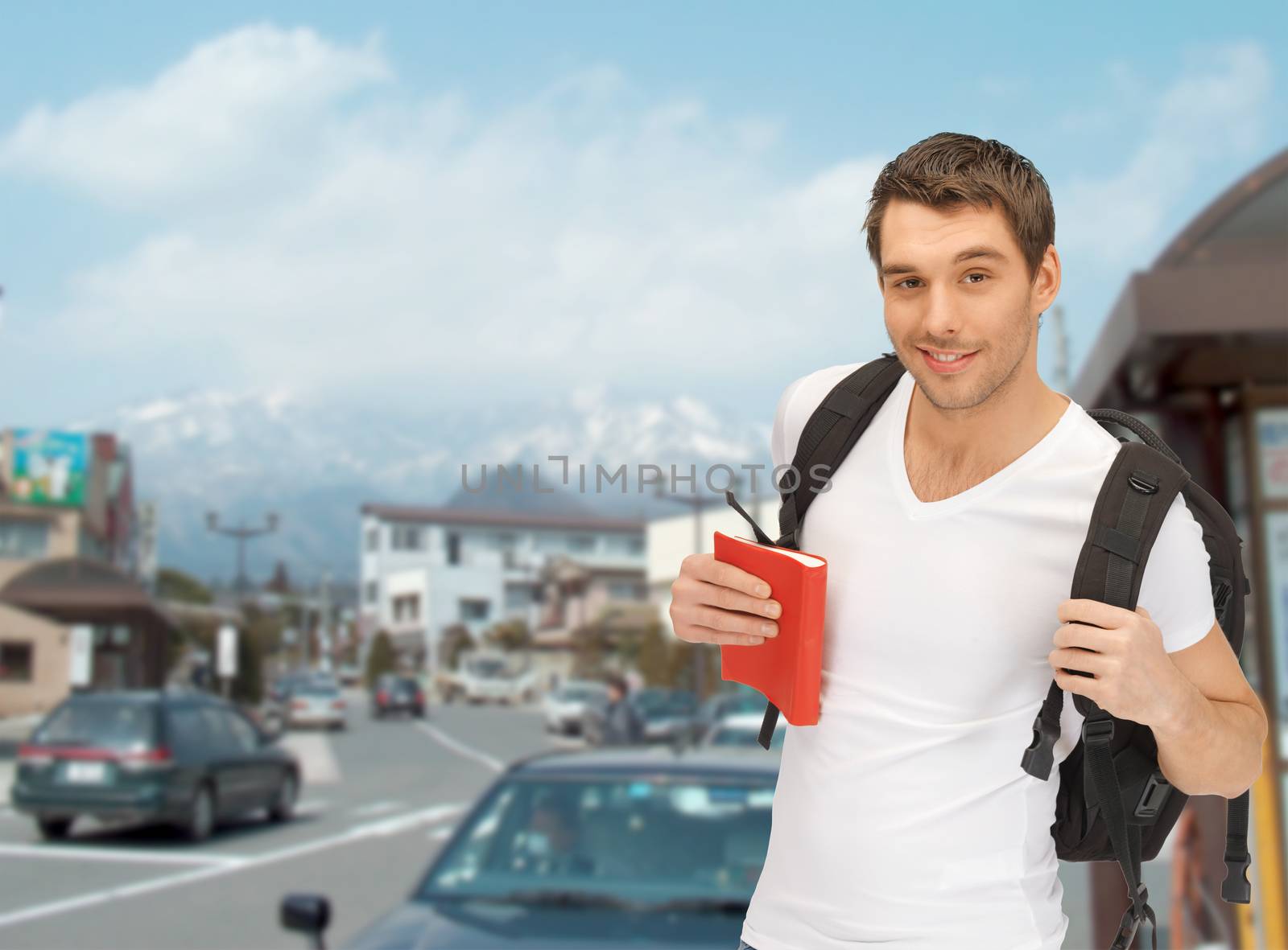 travel, vacation and education concept - travelling student with backpack and book