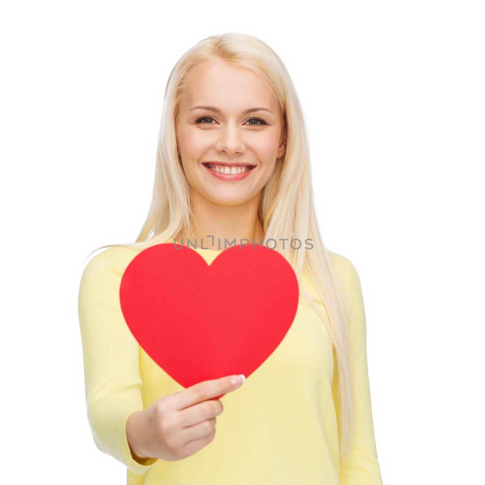 happiness, health and love concept - smiling woman with red heart