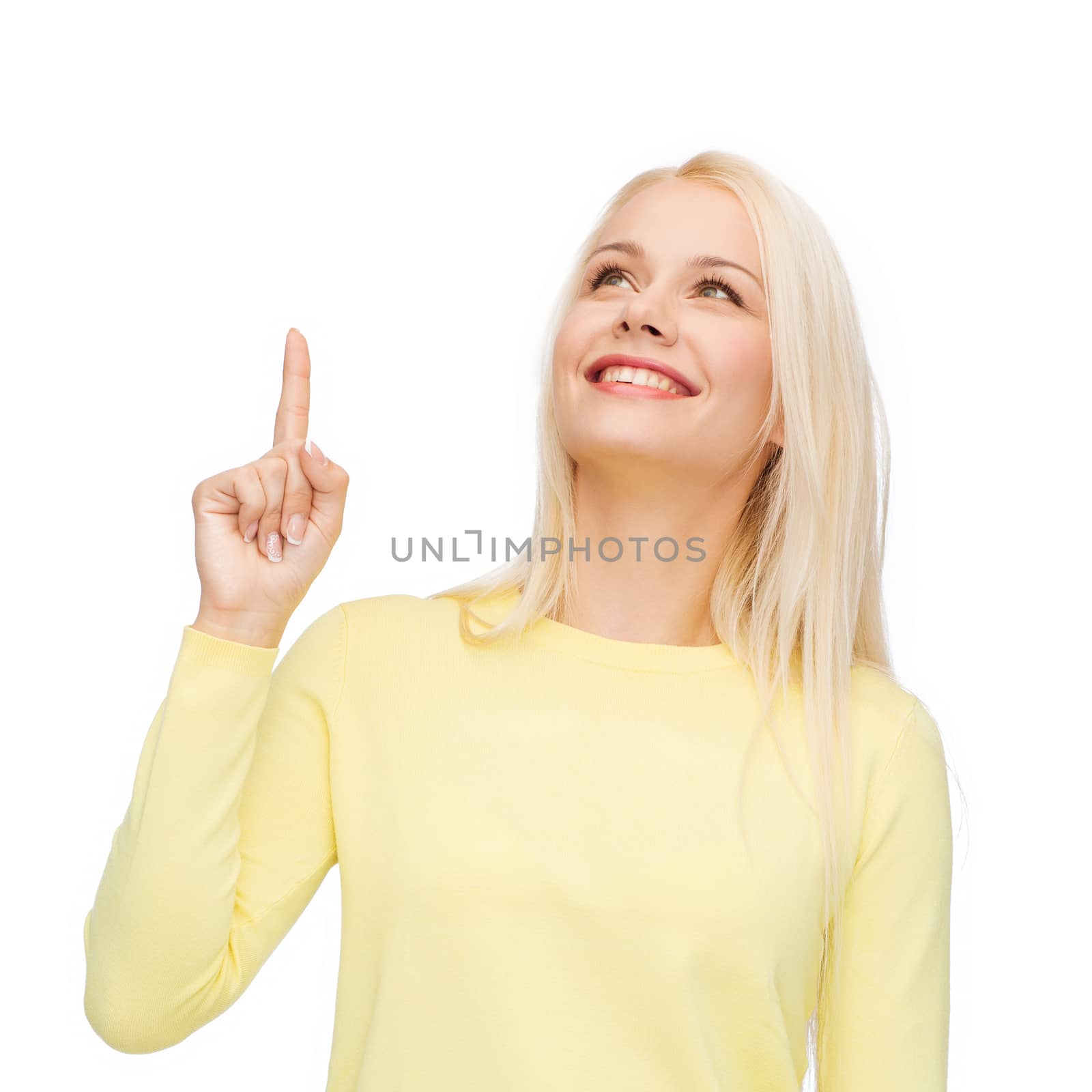 smiling woman pointing her finger up by dolgachov
