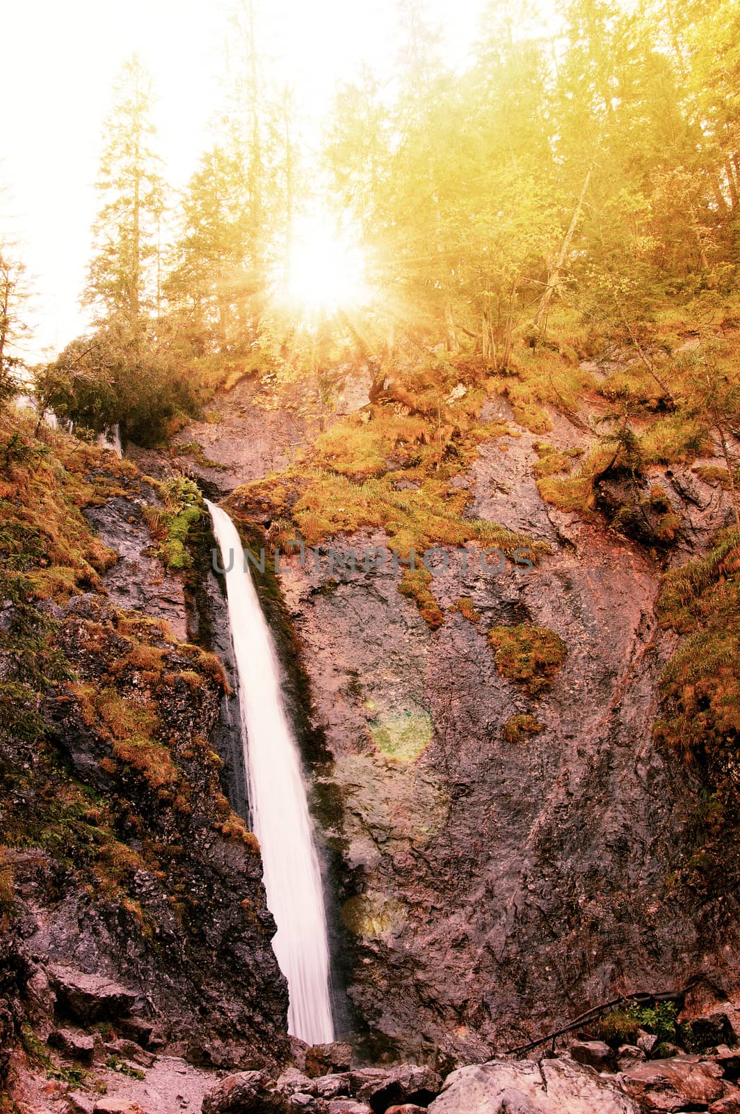 Waterfall in mountains. Nature conceptual image.