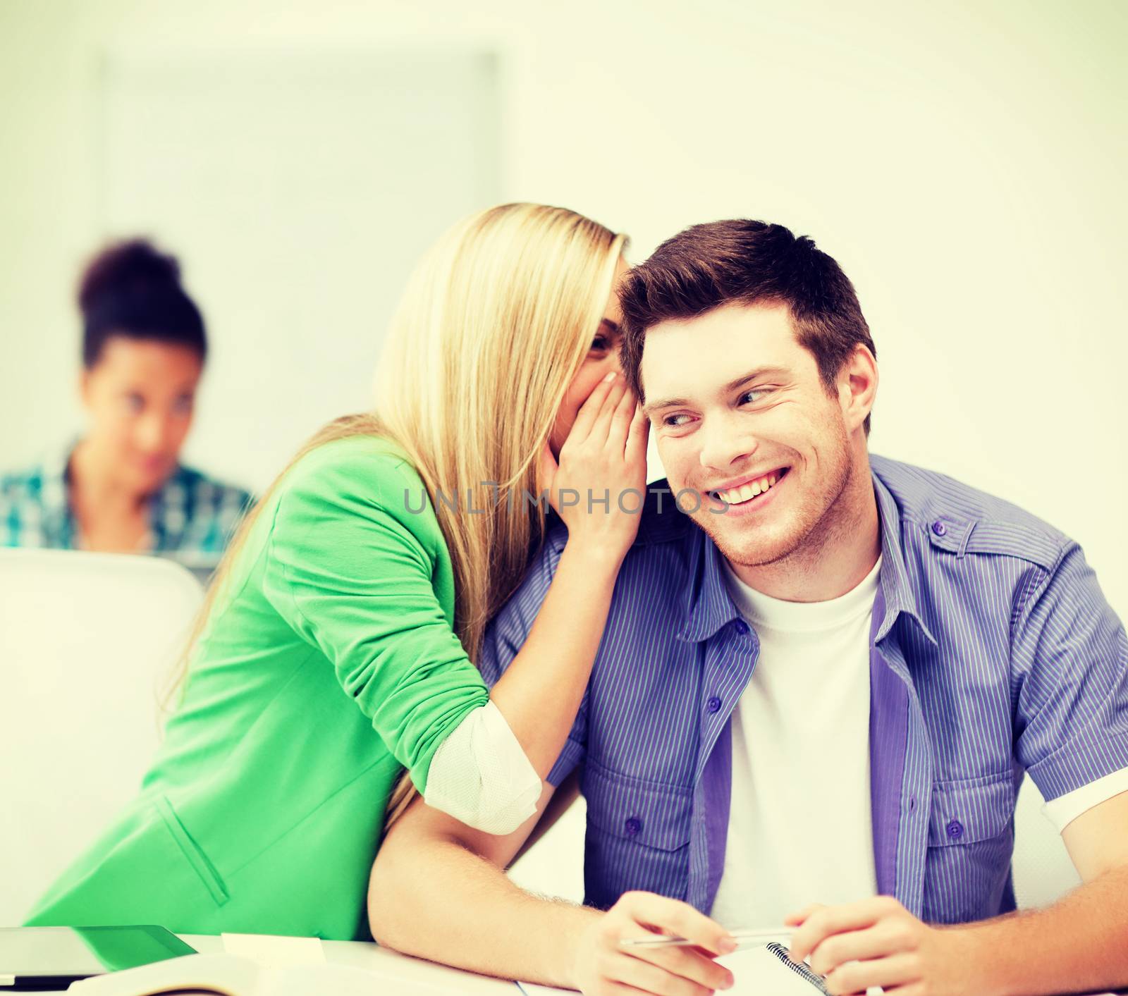 education concept - group of students gossiping at school