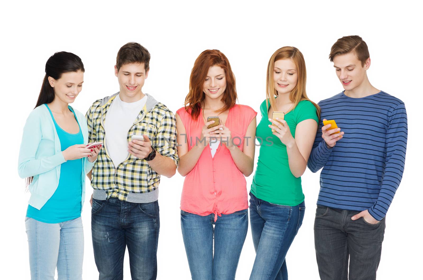 smiling students with smartphones by dolgachov