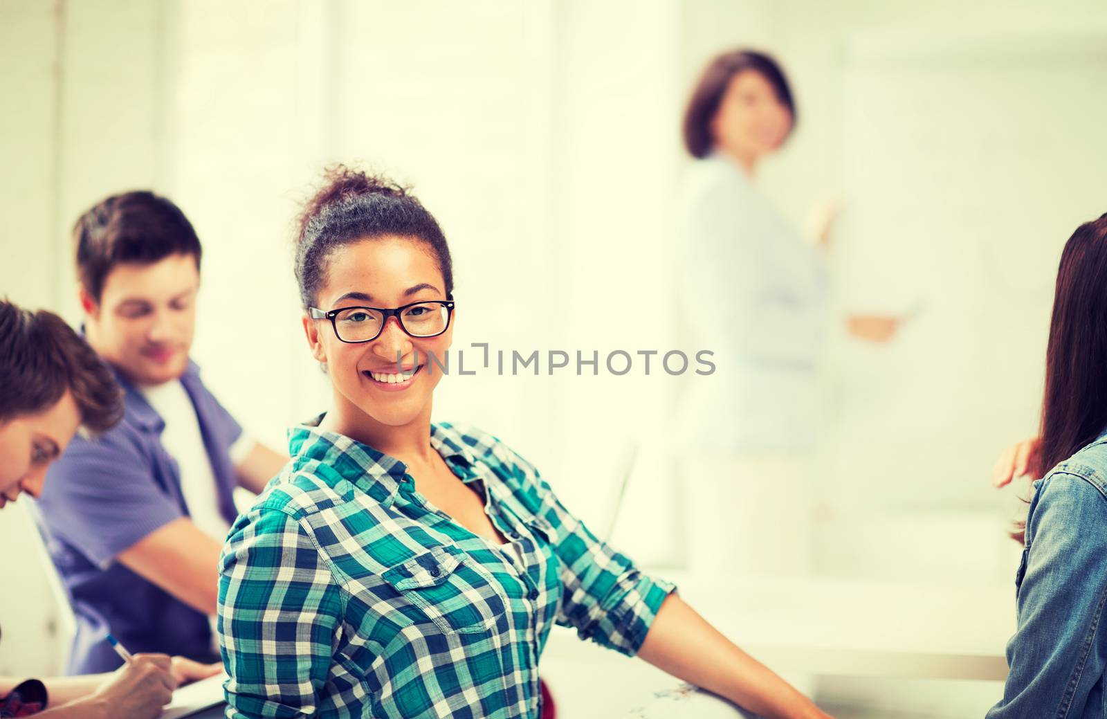 african student girl at school by dolgachov